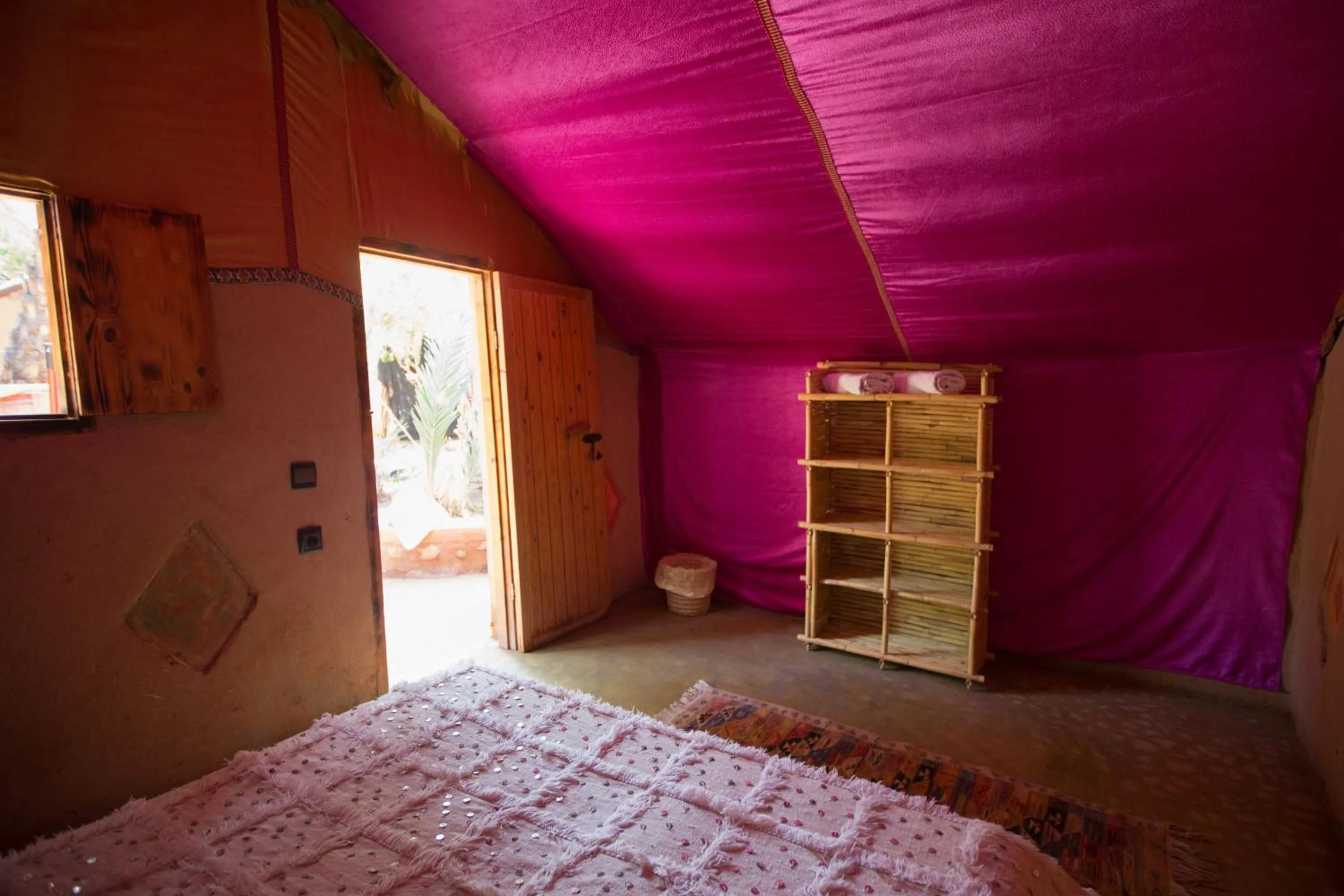 Bed in Ecolodge La Palmeraie