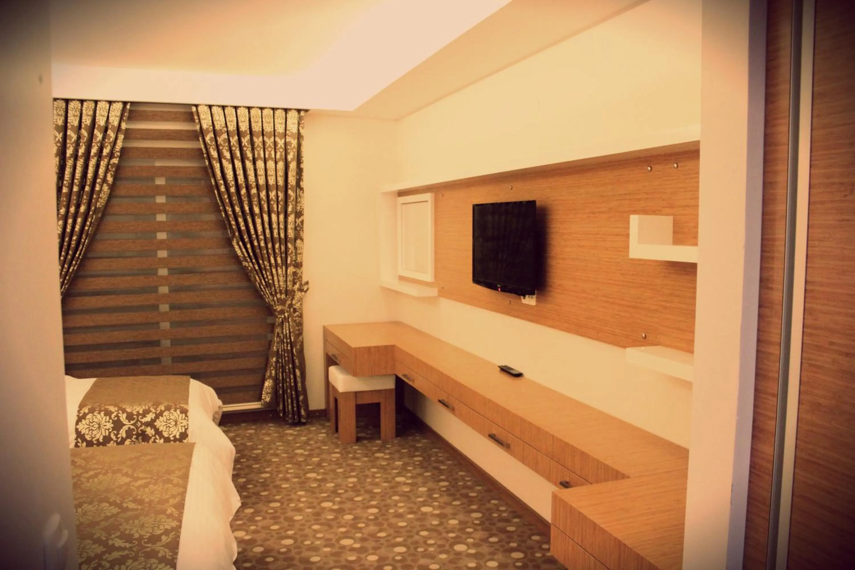 TV and multimedia, Bed in Cebeciler Hotel