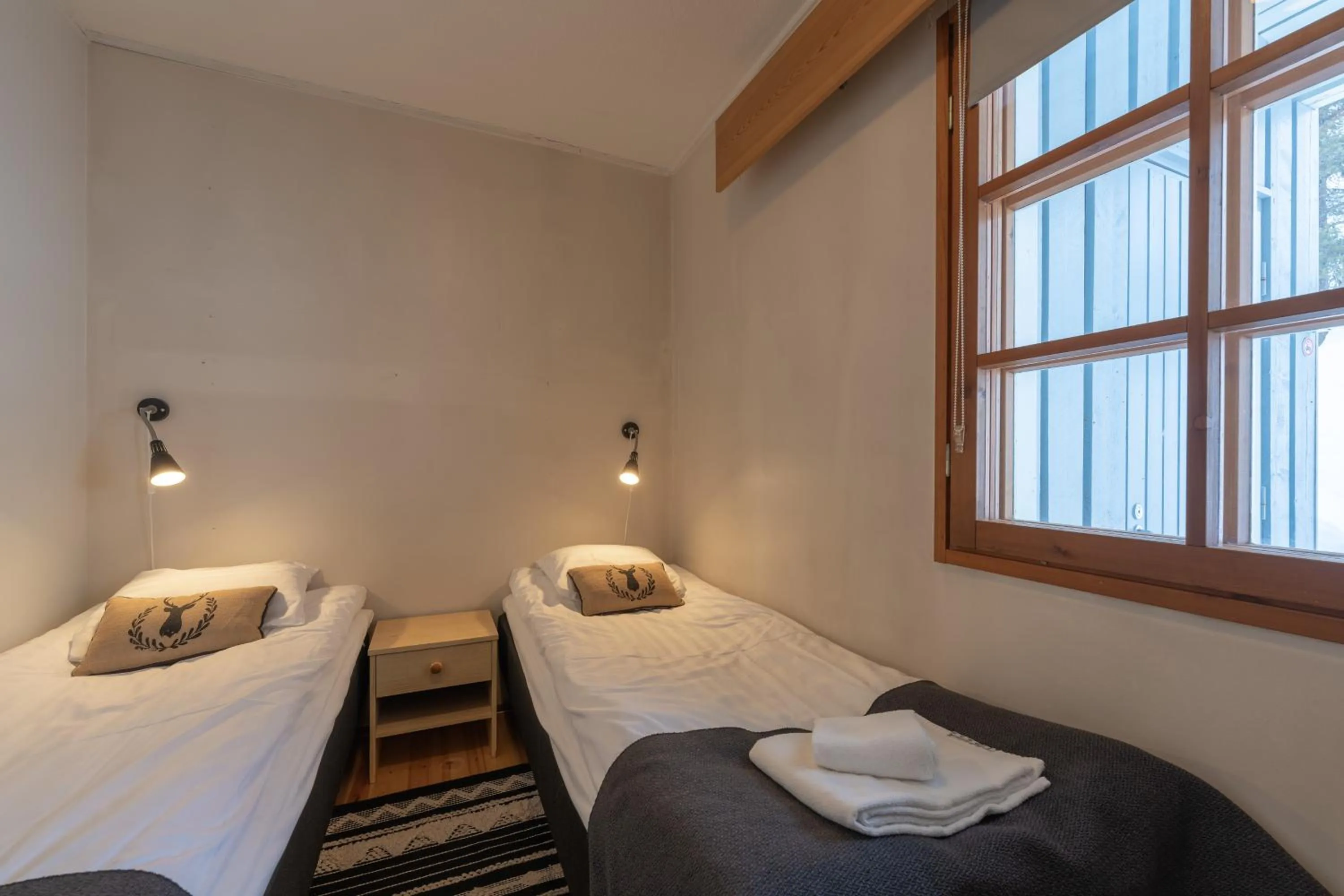 Bed in Kuukkeli Apartments Saarisatu ja Urupää