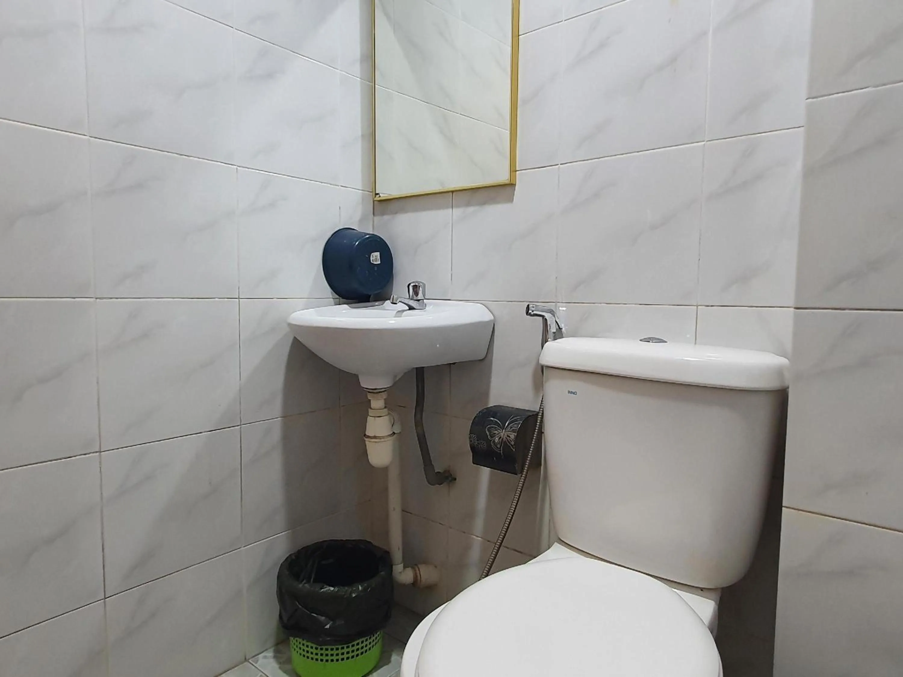 Bathroom in Hotel O Melody 88 Inn