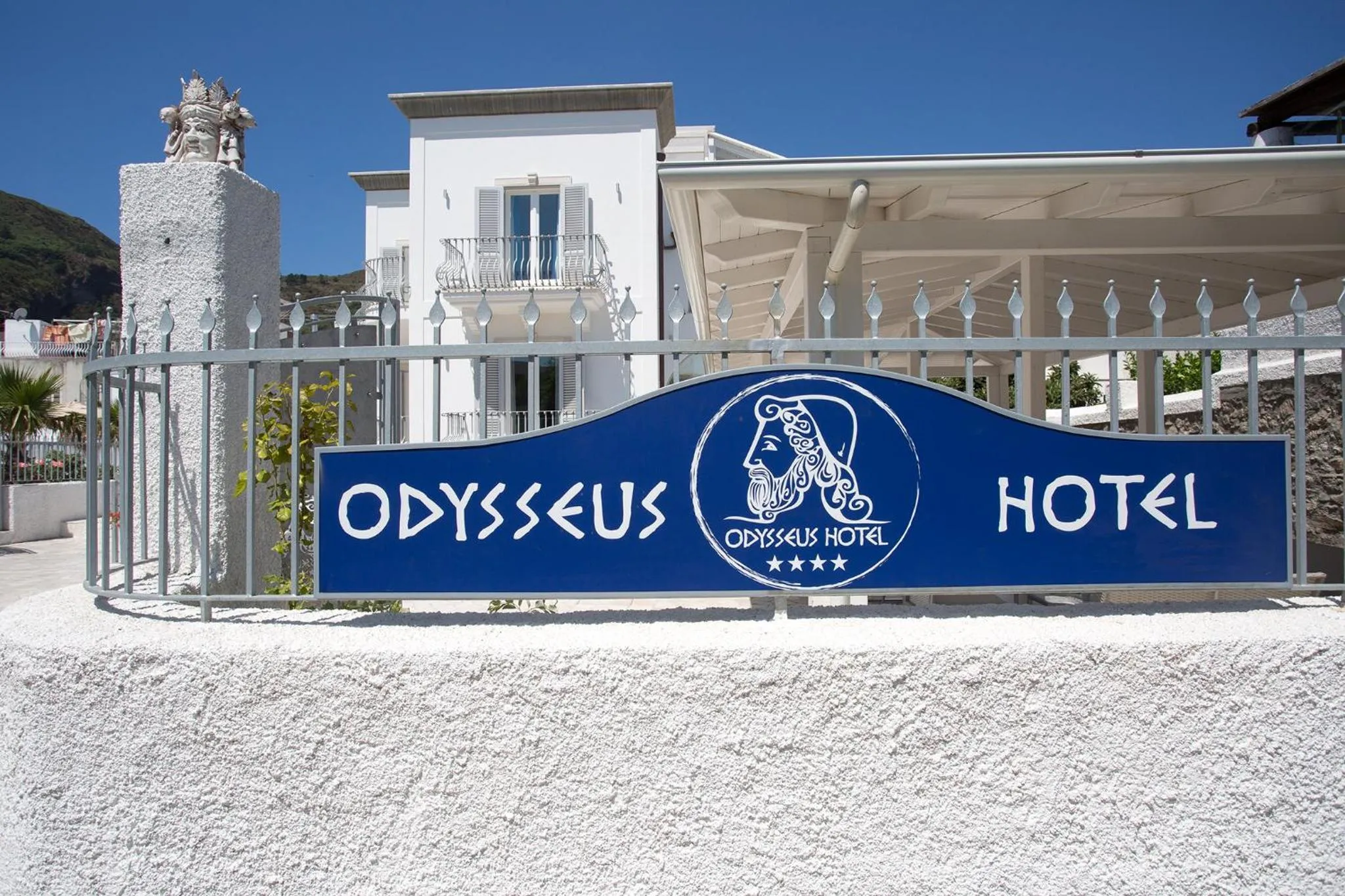 Property logo or sign in Odysseus Hotel