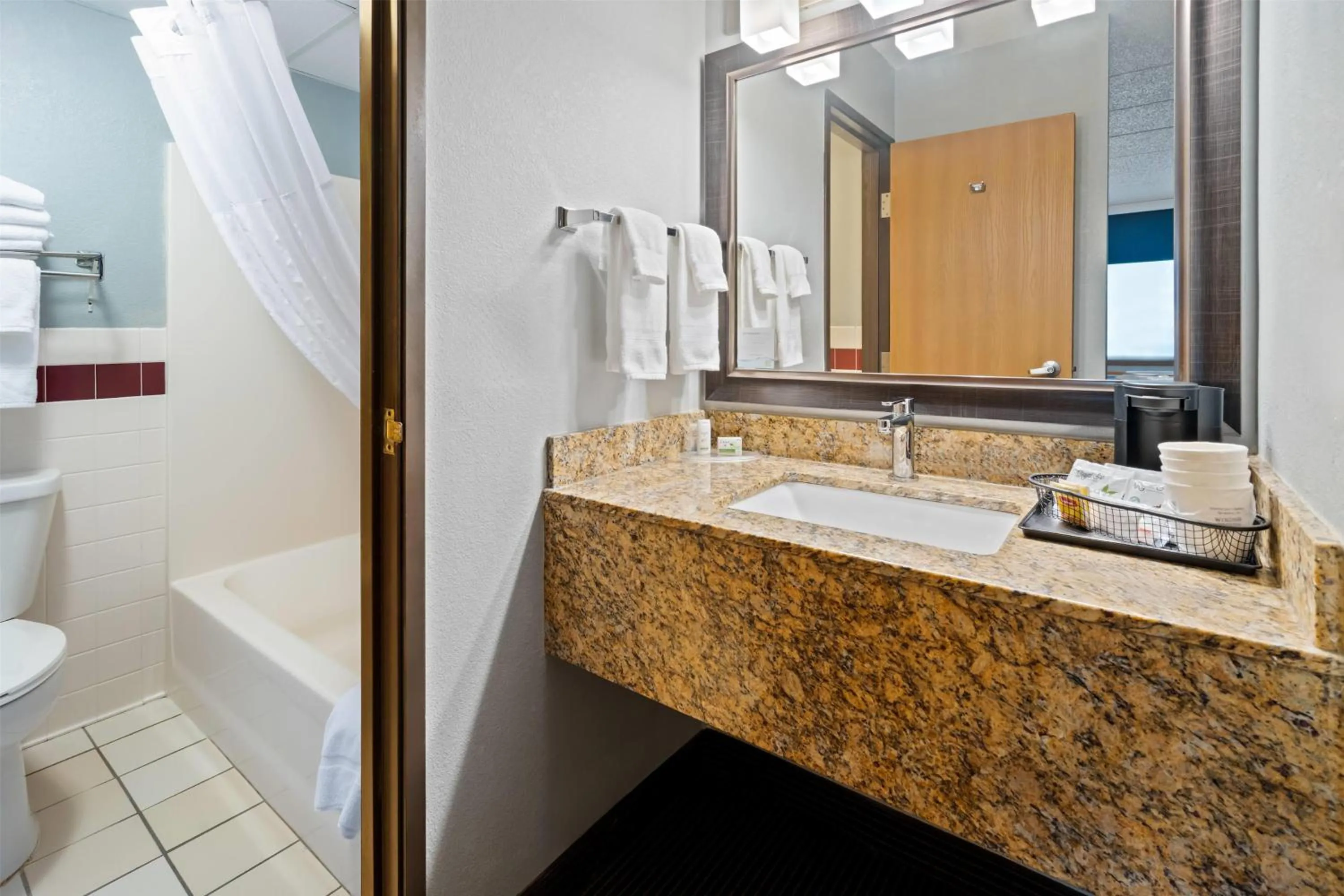 Bathroom in AmericInn by Wyndham Bismarck