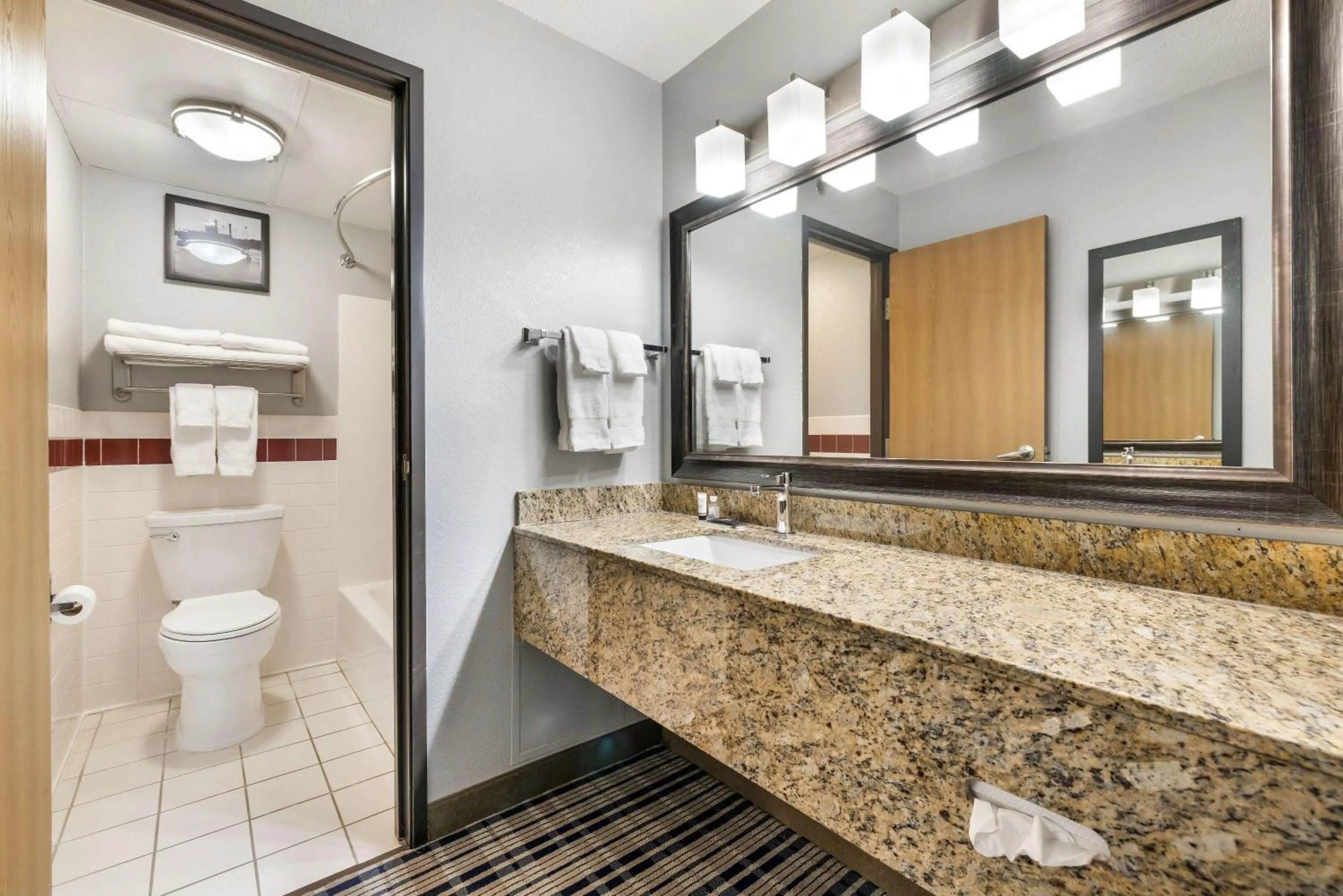 Bathroom in AmericInn by Wyndham Bismarck