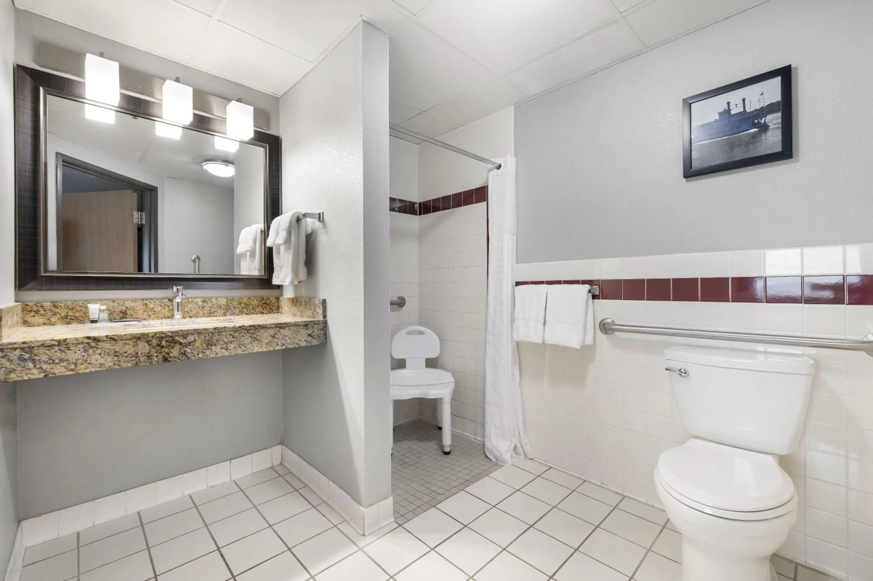 Shower in AmericInn by Wyndham Bismarck