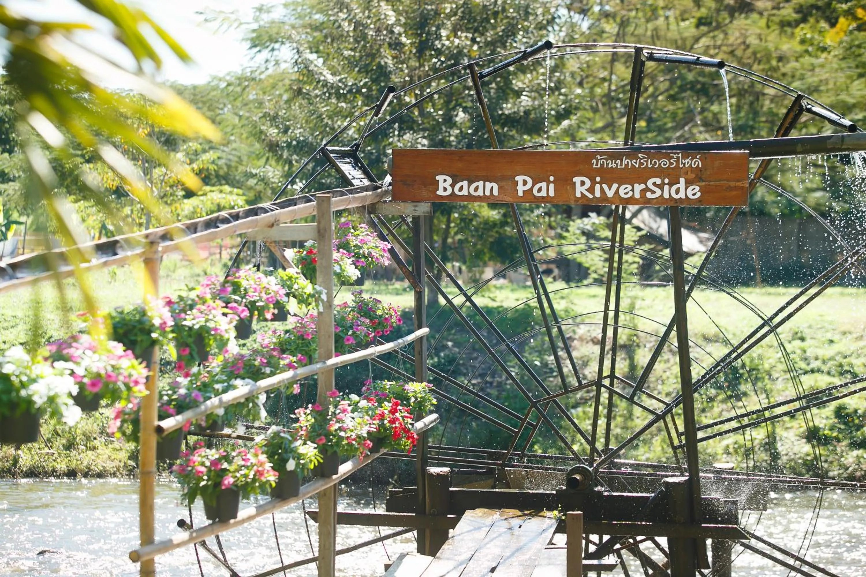 Property logo or sign in Baan Pai Riverside Resort
