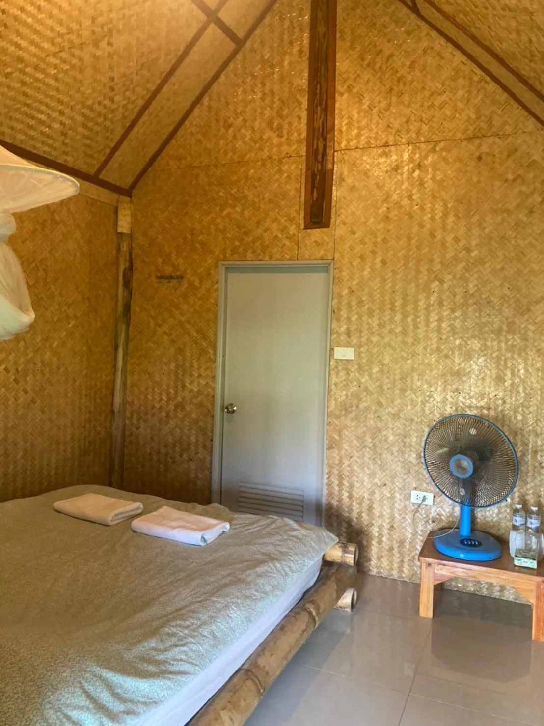 Bed in Baan Pai Riverside Resort