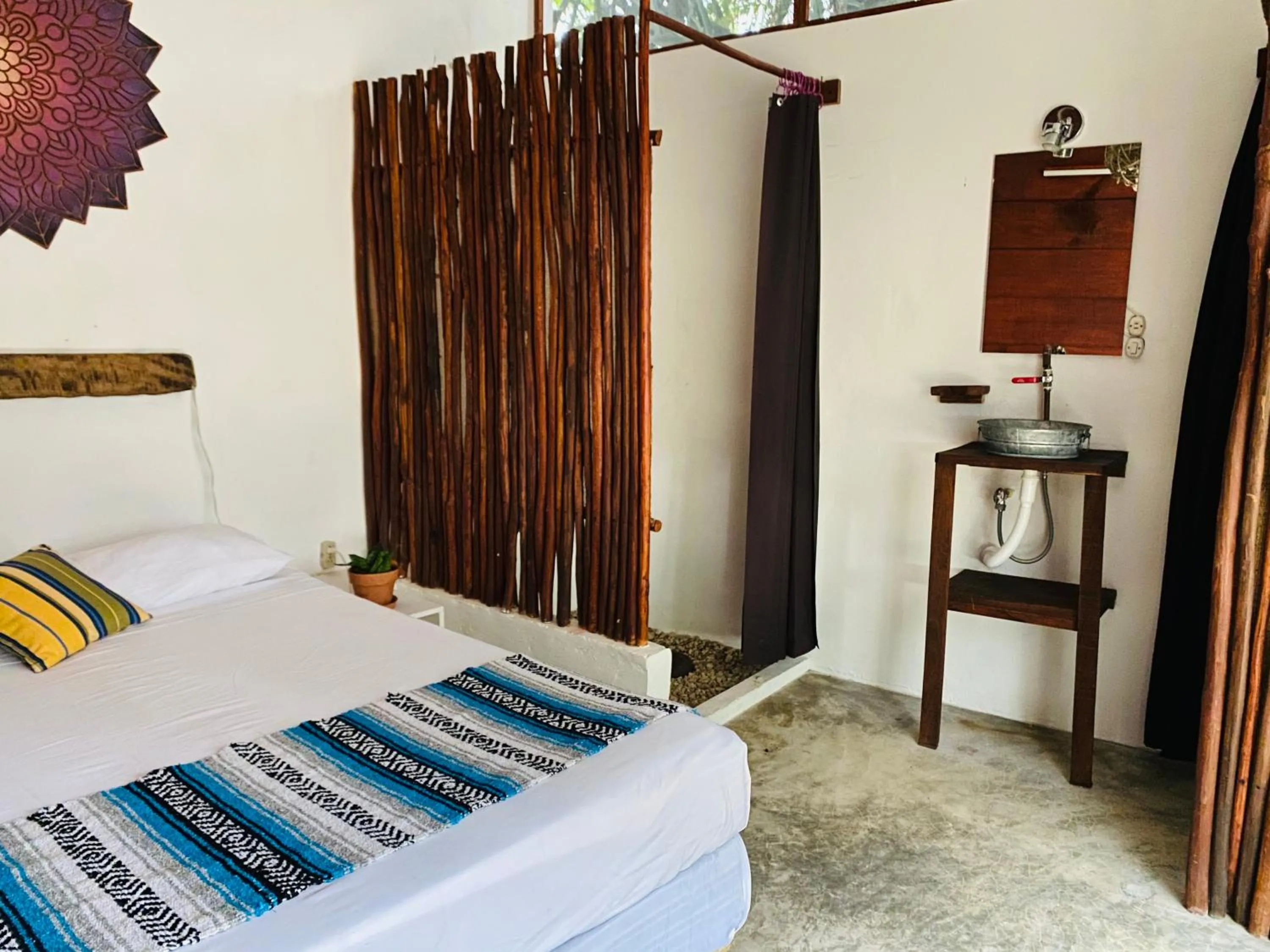 Photo of the whole room, Bed in El Búho Bacalar Eco-Cabañas Hostal