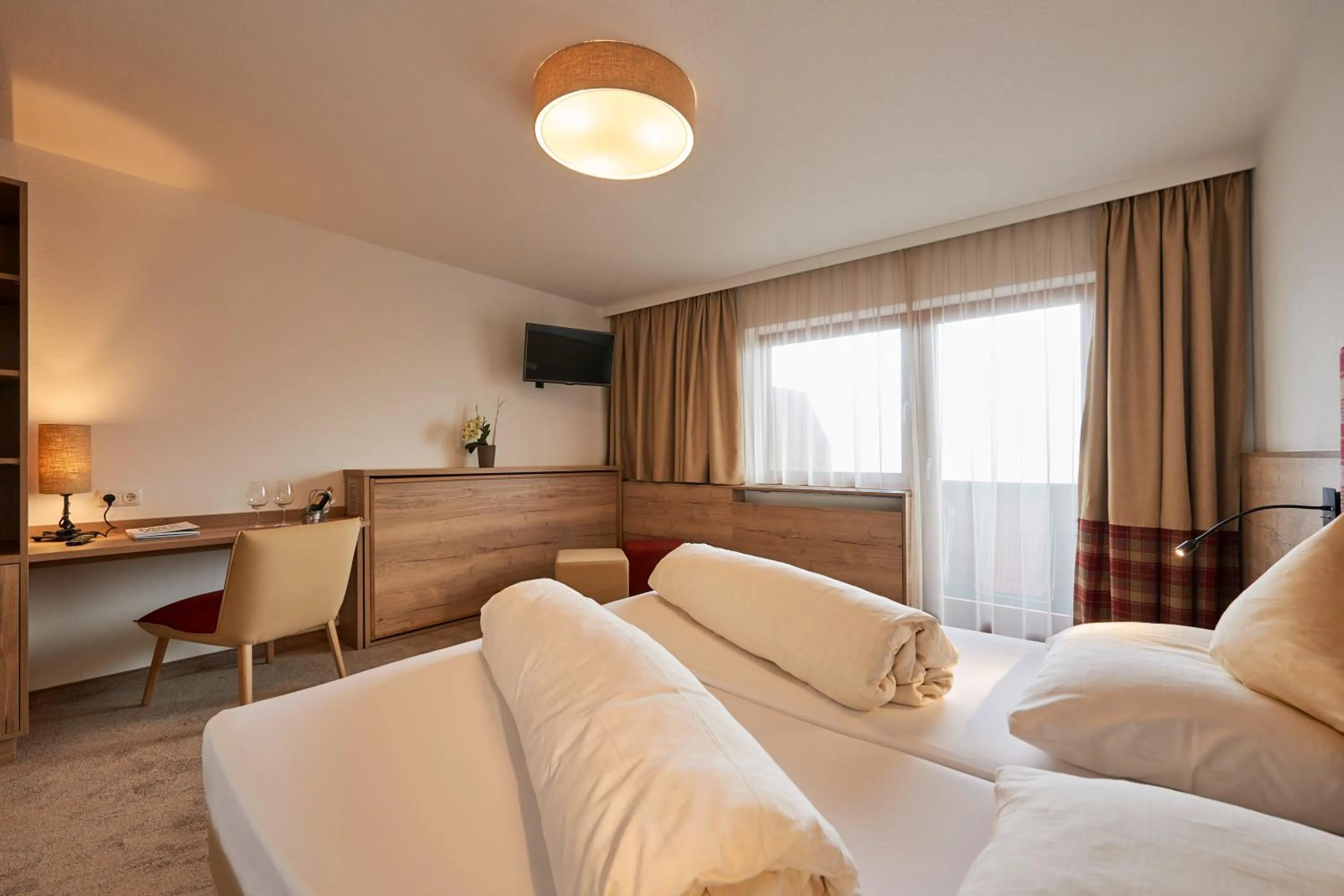 Photo of the whole room, Bed in Alpenhotel Laurin