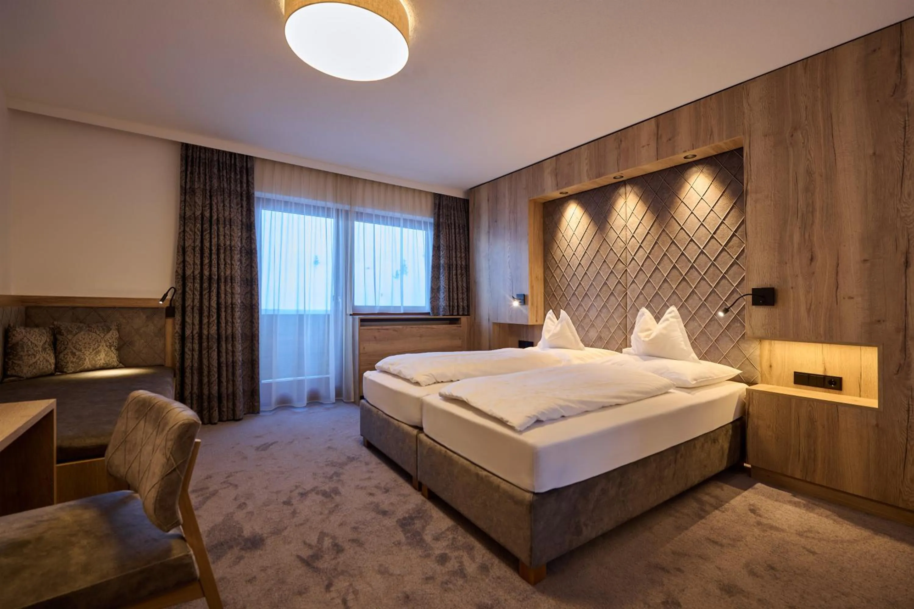 Photo of the whole room, Bed in Alpenhotel Laurin