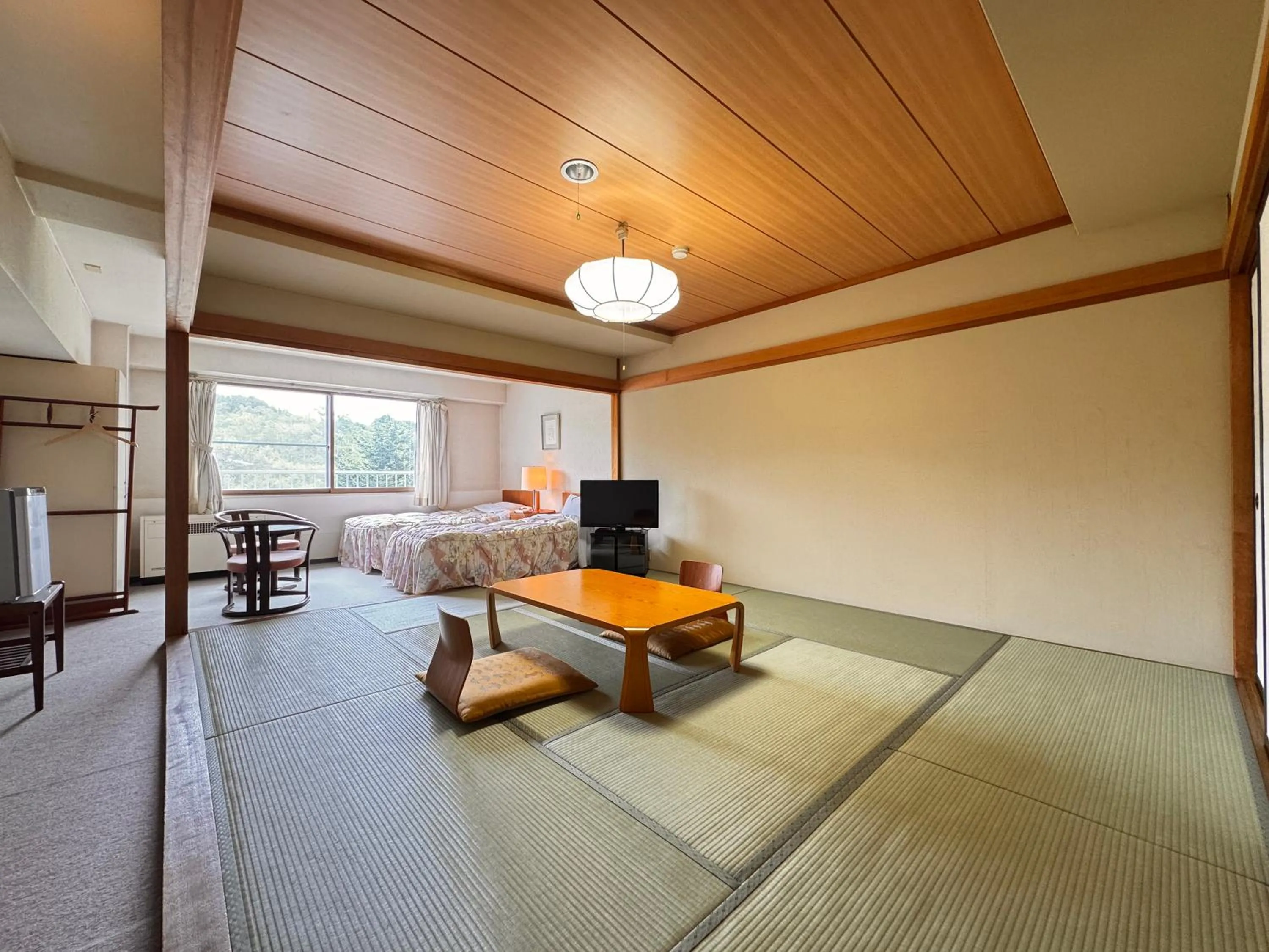 Bed in Kidoike Onsen Hotel