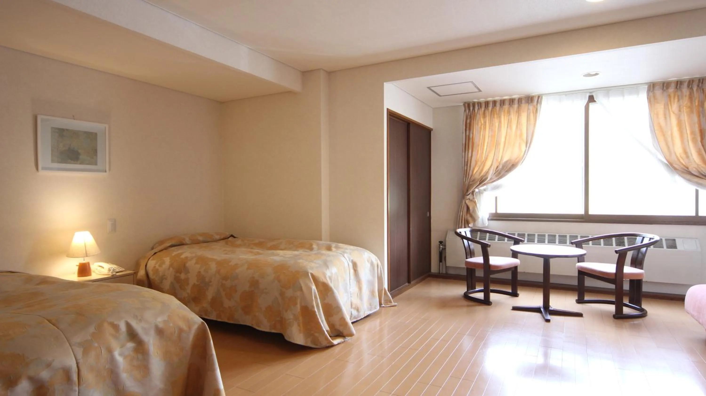 Bed in Kidoike Onsen Hotel