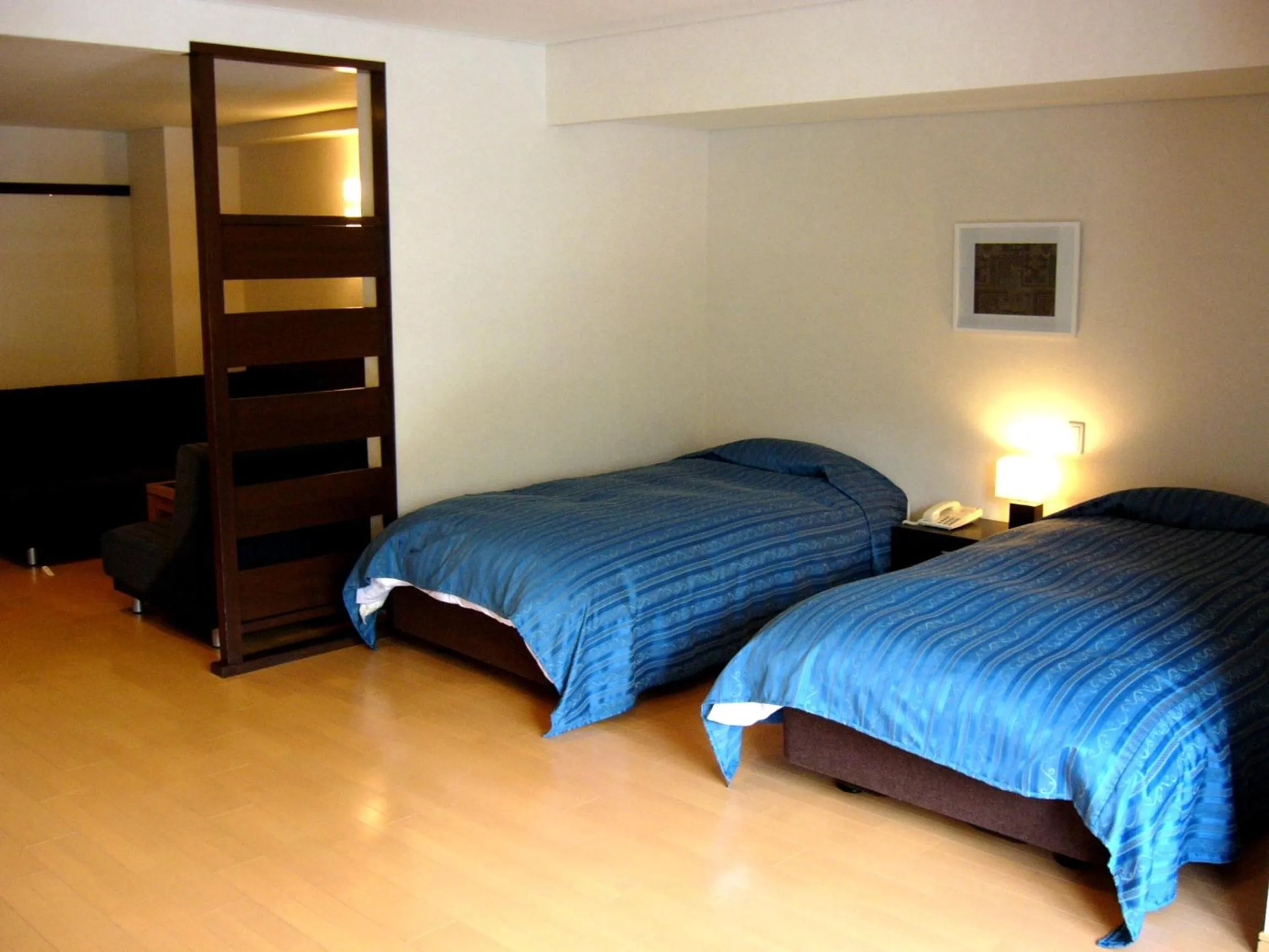 Bed in Kidoike Onsen Hotel