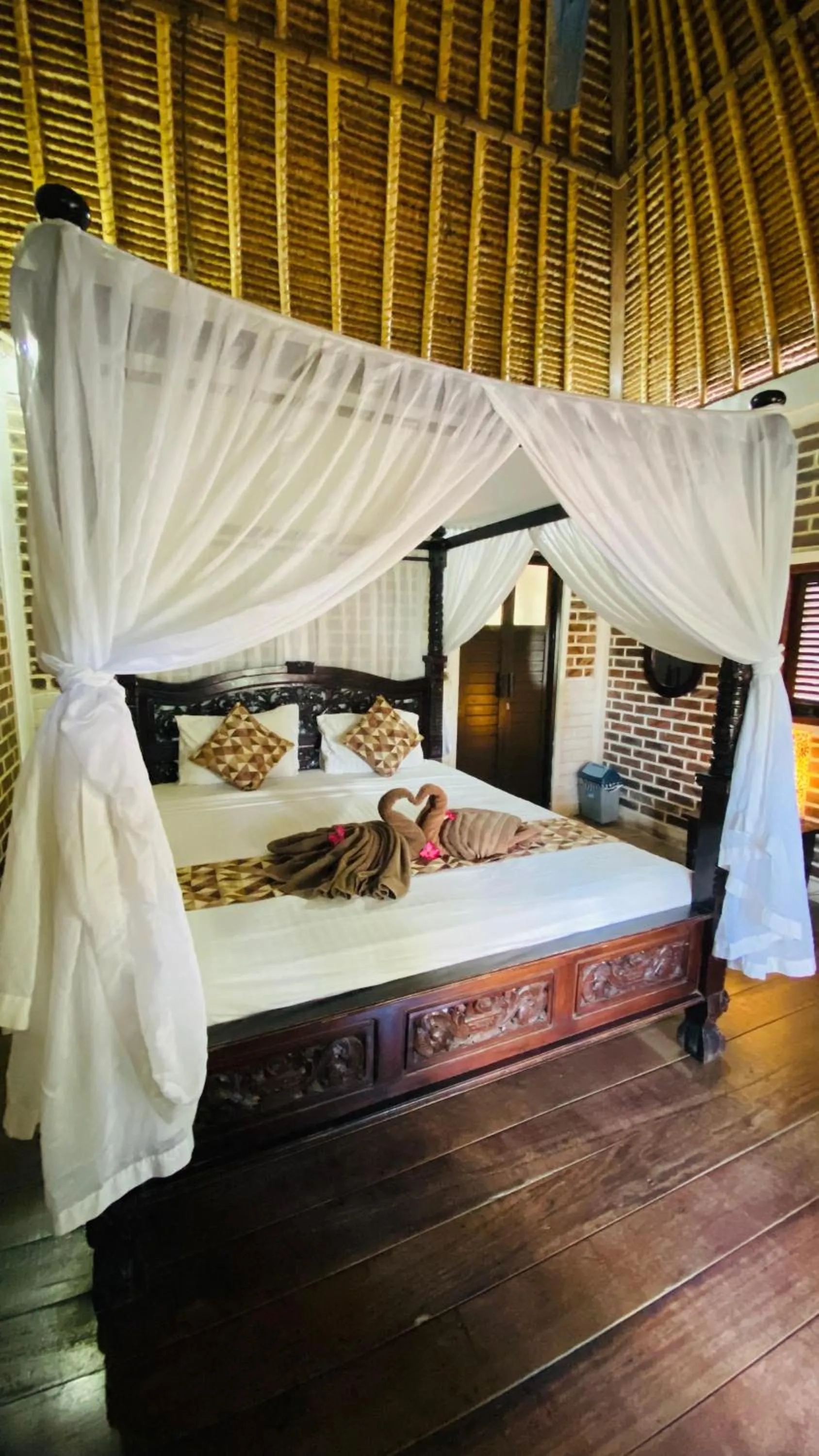 Bed in Balangan Sea View Bungalow