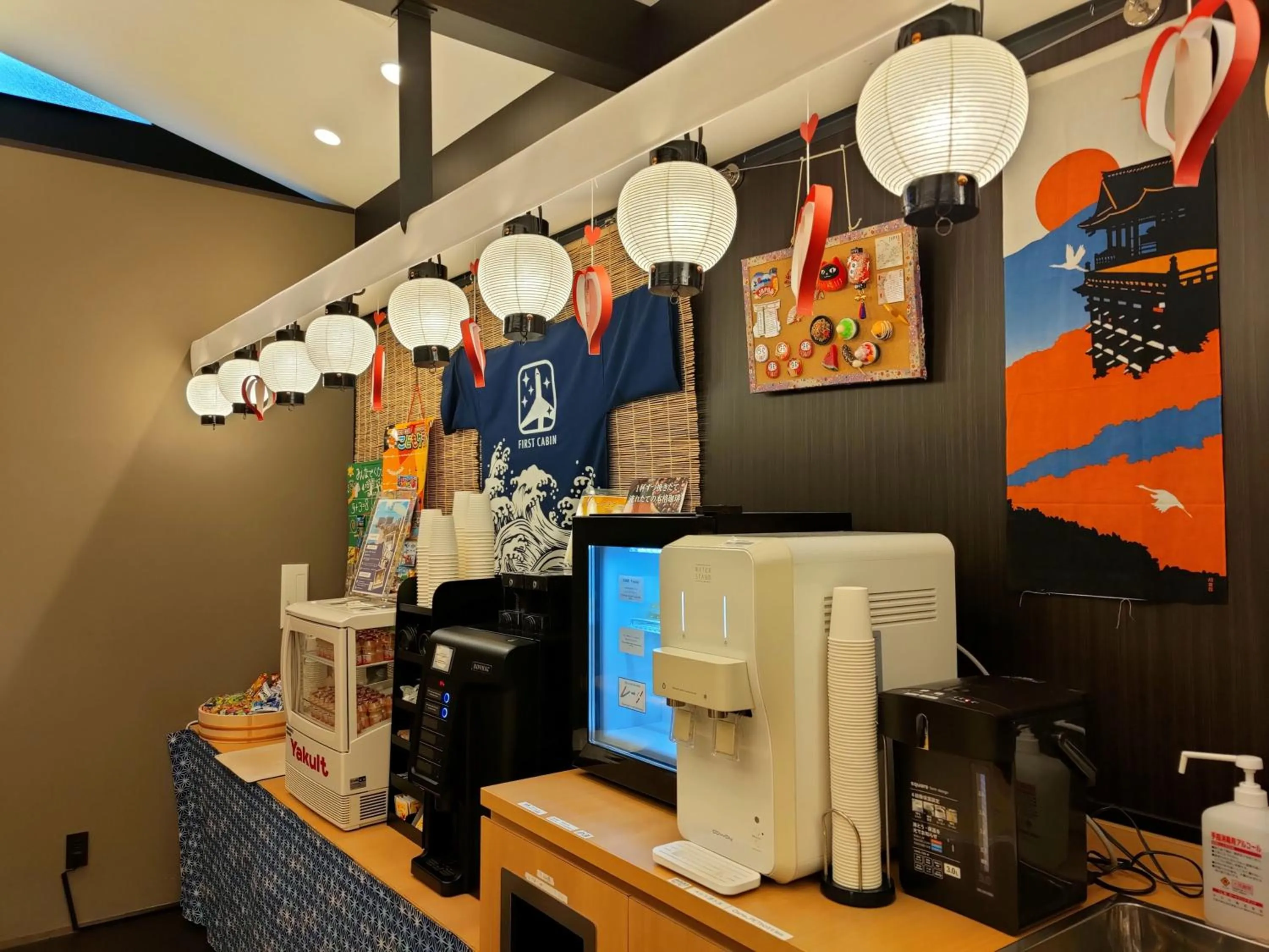 Communal lounge/ TV room in FIRSTCABIN Kyoto Nijojo