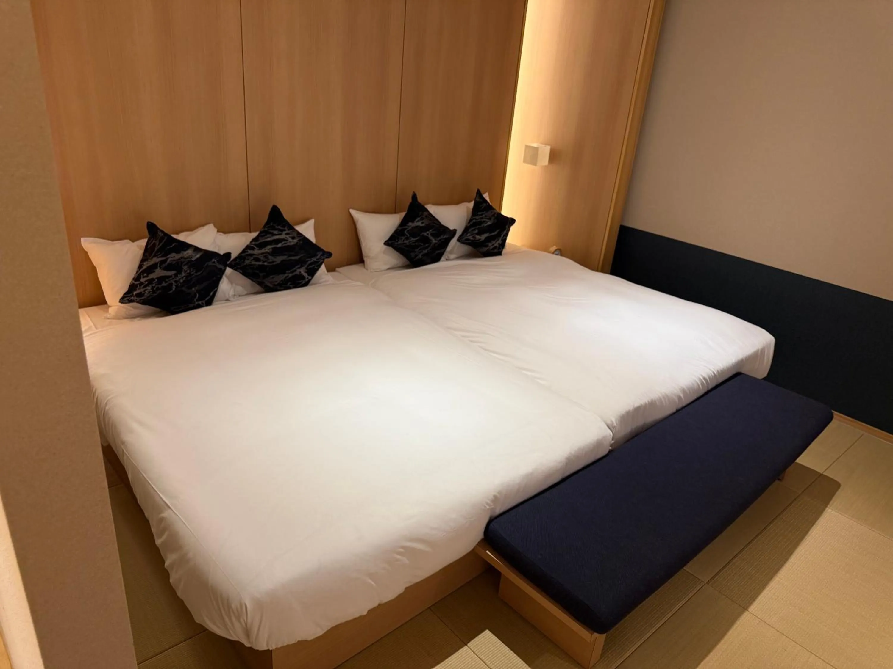 Bed in FIRSTCABIN Kyoto Nijojo