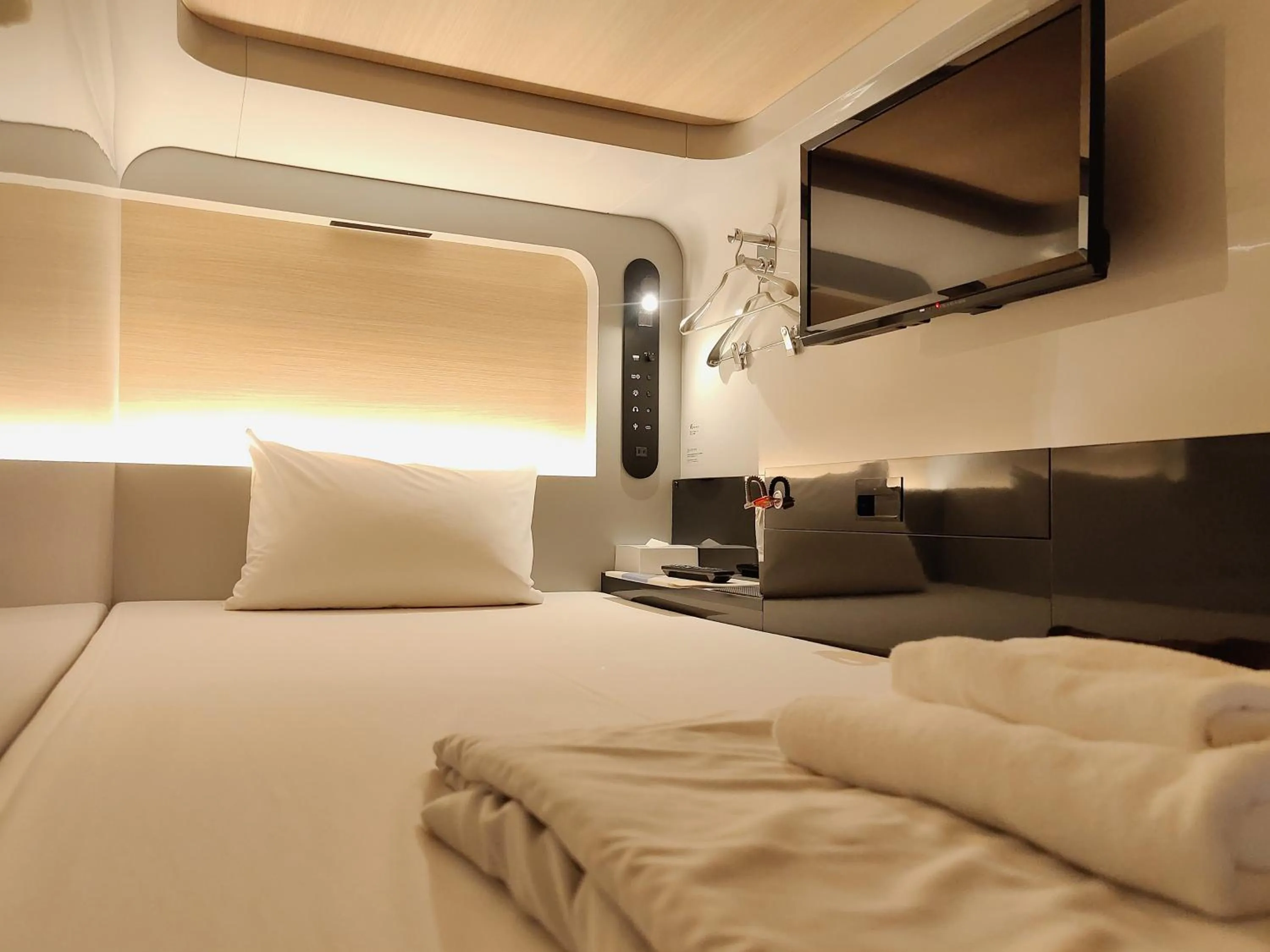 Bed in FIRSTCABIN Kyoto Nijojo