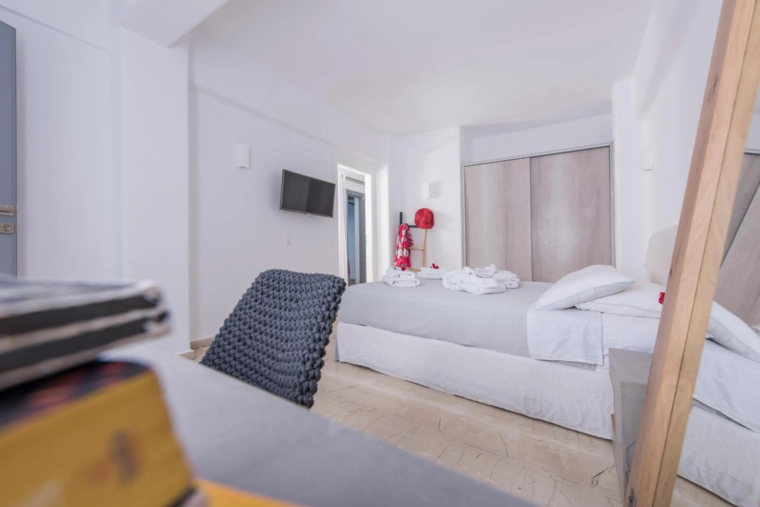 Bed in Blue Waves Suites & Apartments