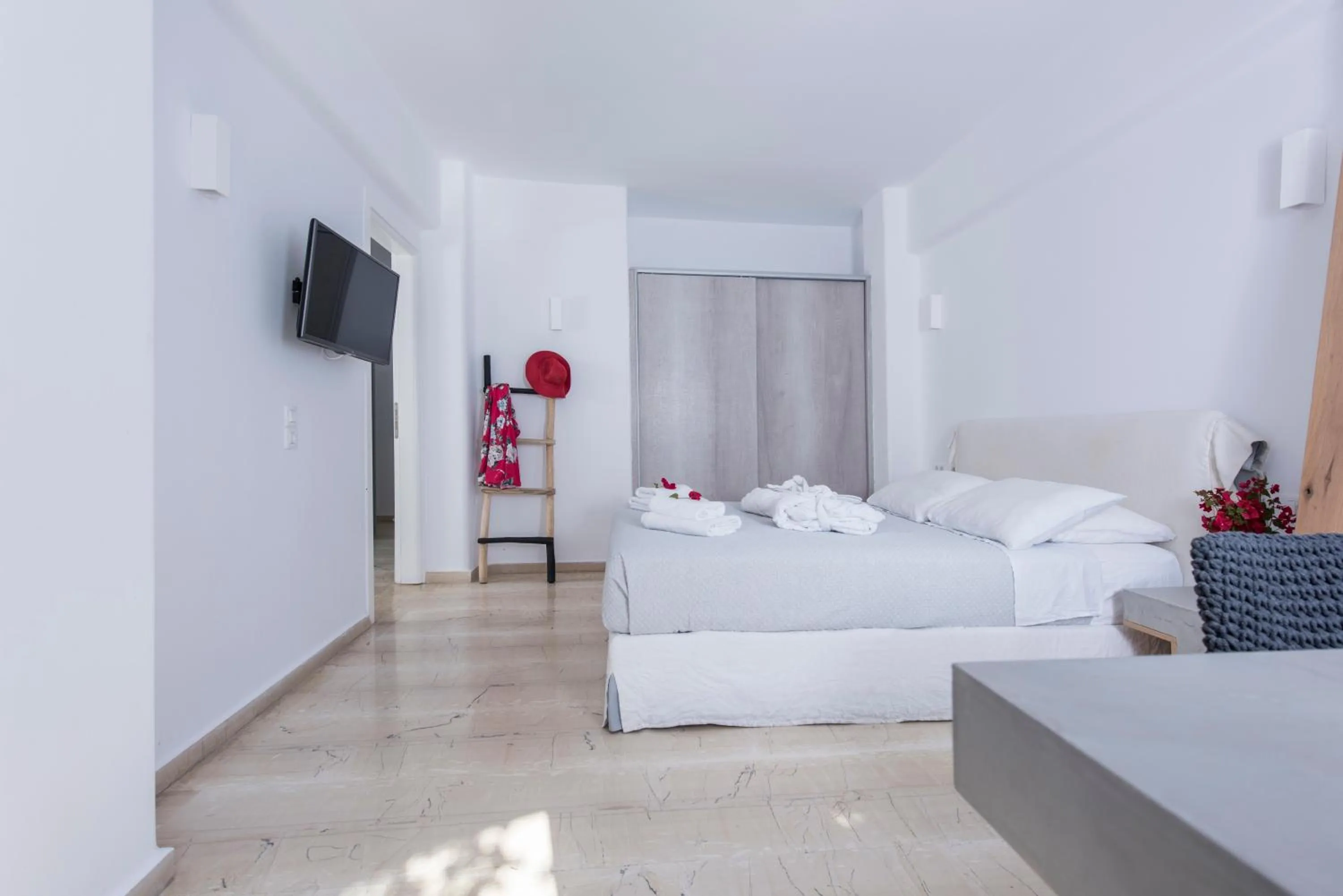 Bed in Blue Waves Suites & Apartments