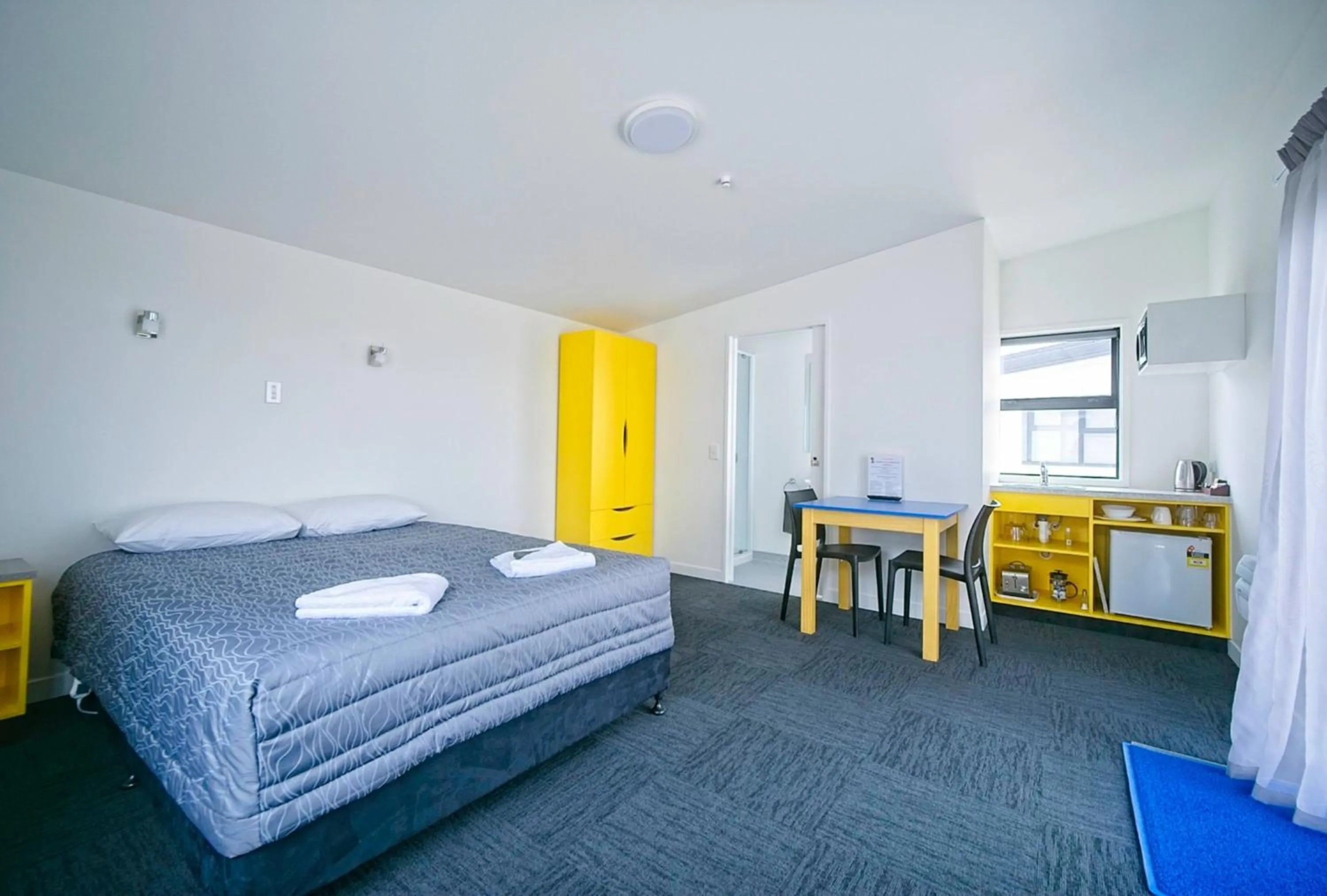 Bed in Hokitika's Kiwi Holiday Park and Motels