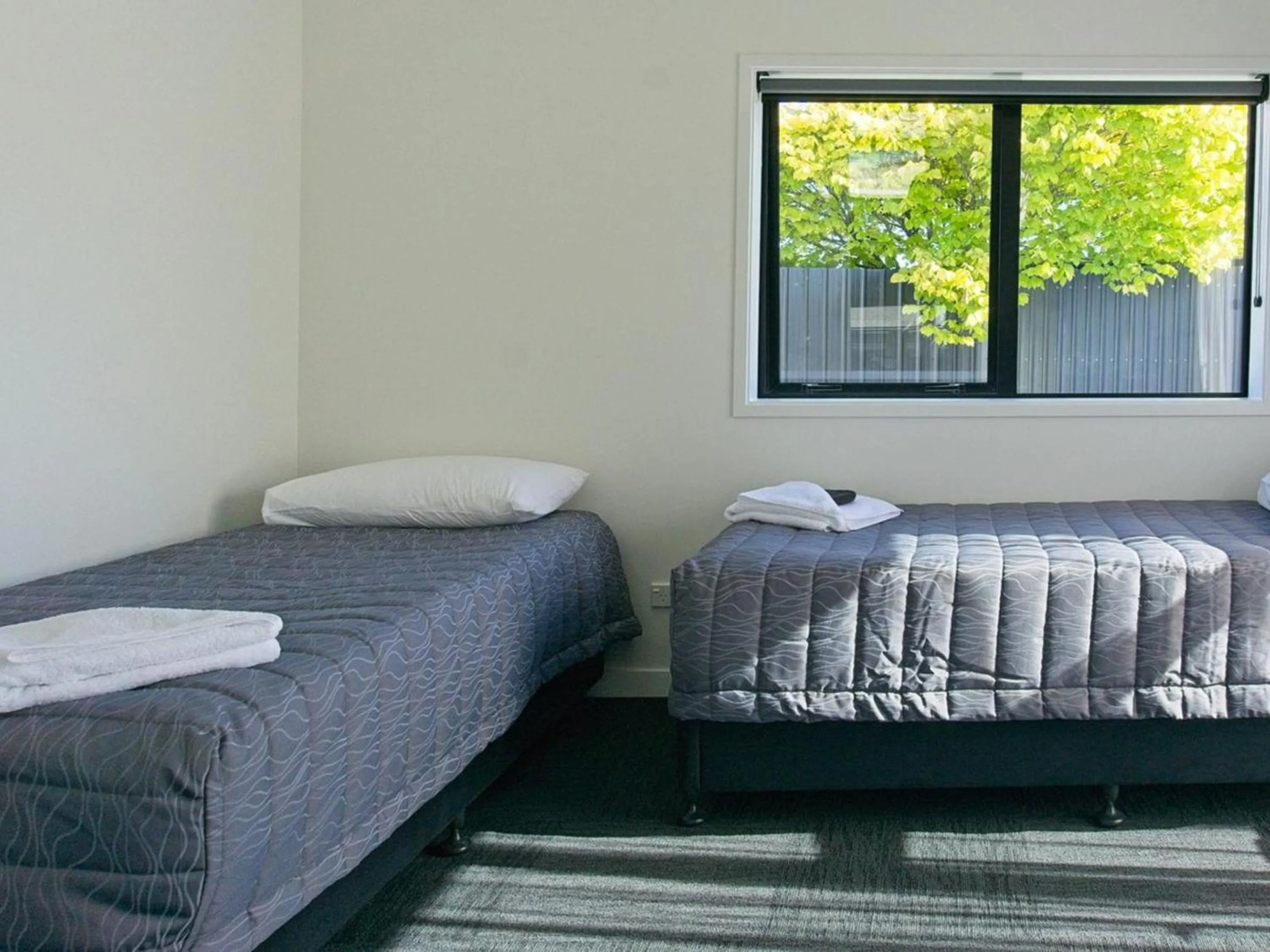 Bed in Hokitika's Kiwi Holiday Park and Motels