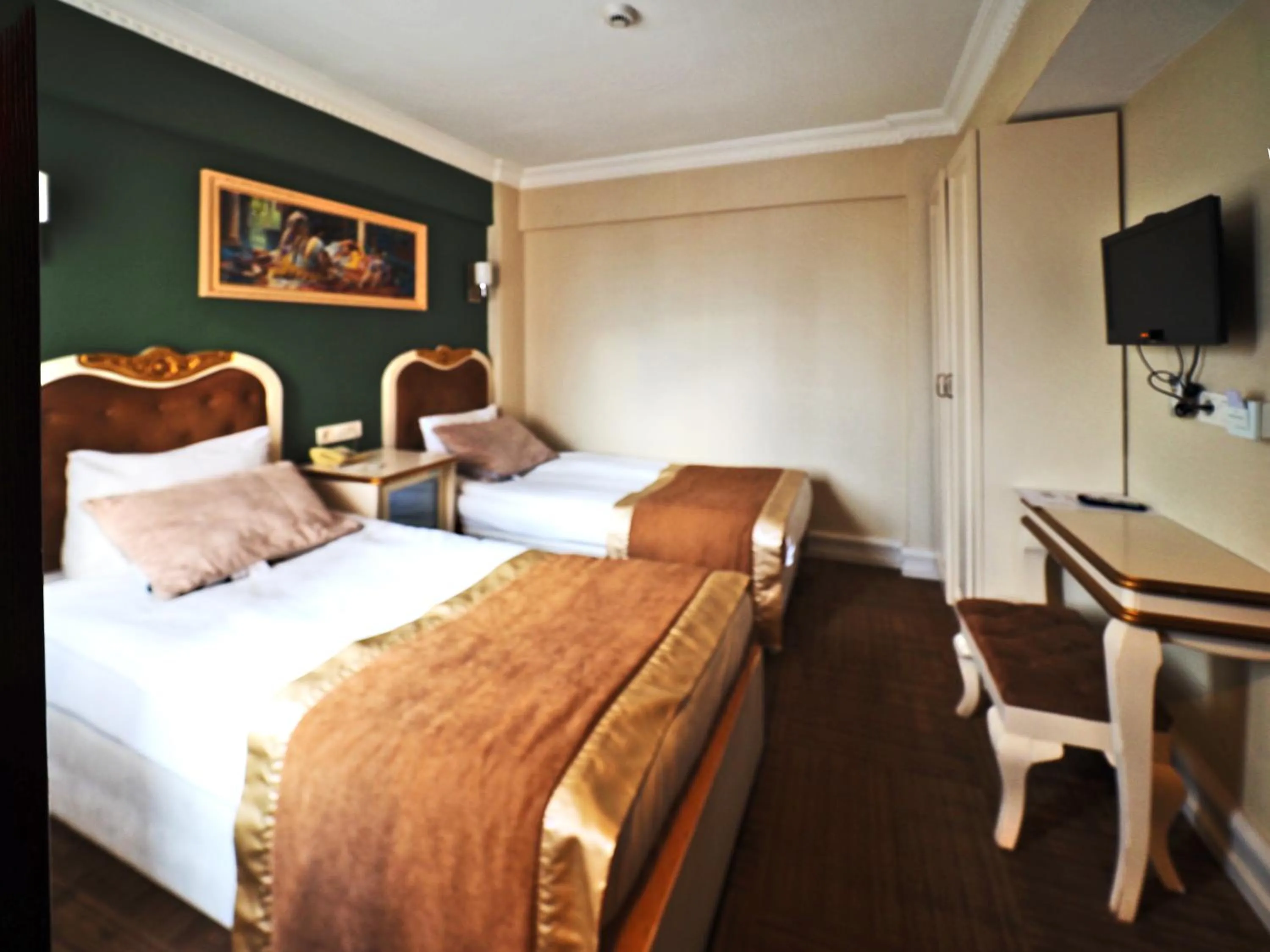 Bed in Elysion Hotel