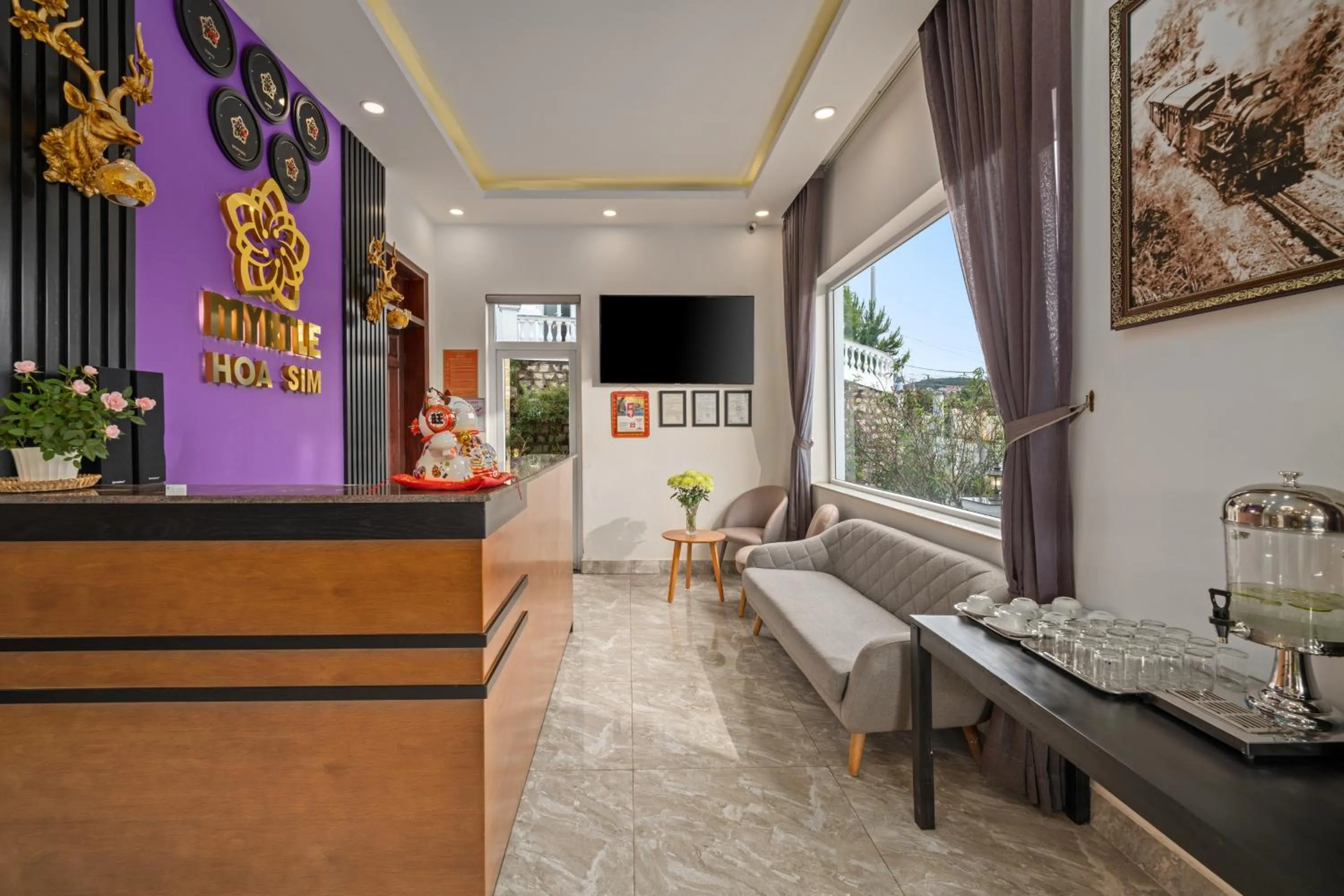 Communal lounge/ TV room in Myrtle Boutique Hotel