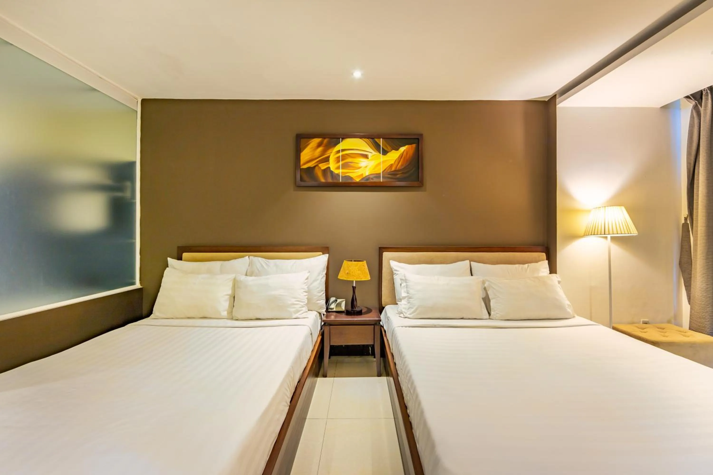 Bed in The Noble Swan Central Dong Du Hotel