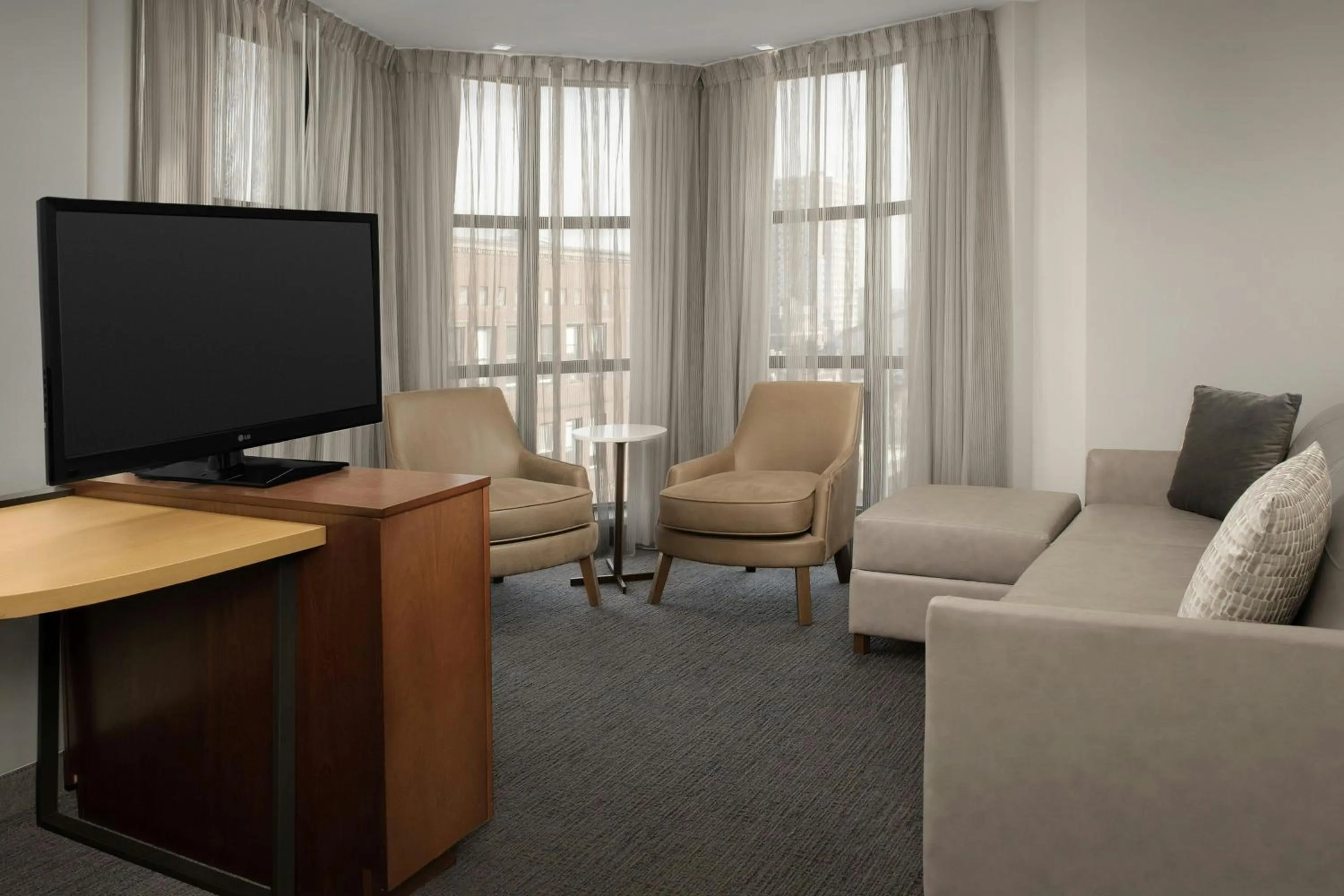Living room in Residence Inn by Marriott Syracuse Downtown at Armory Square