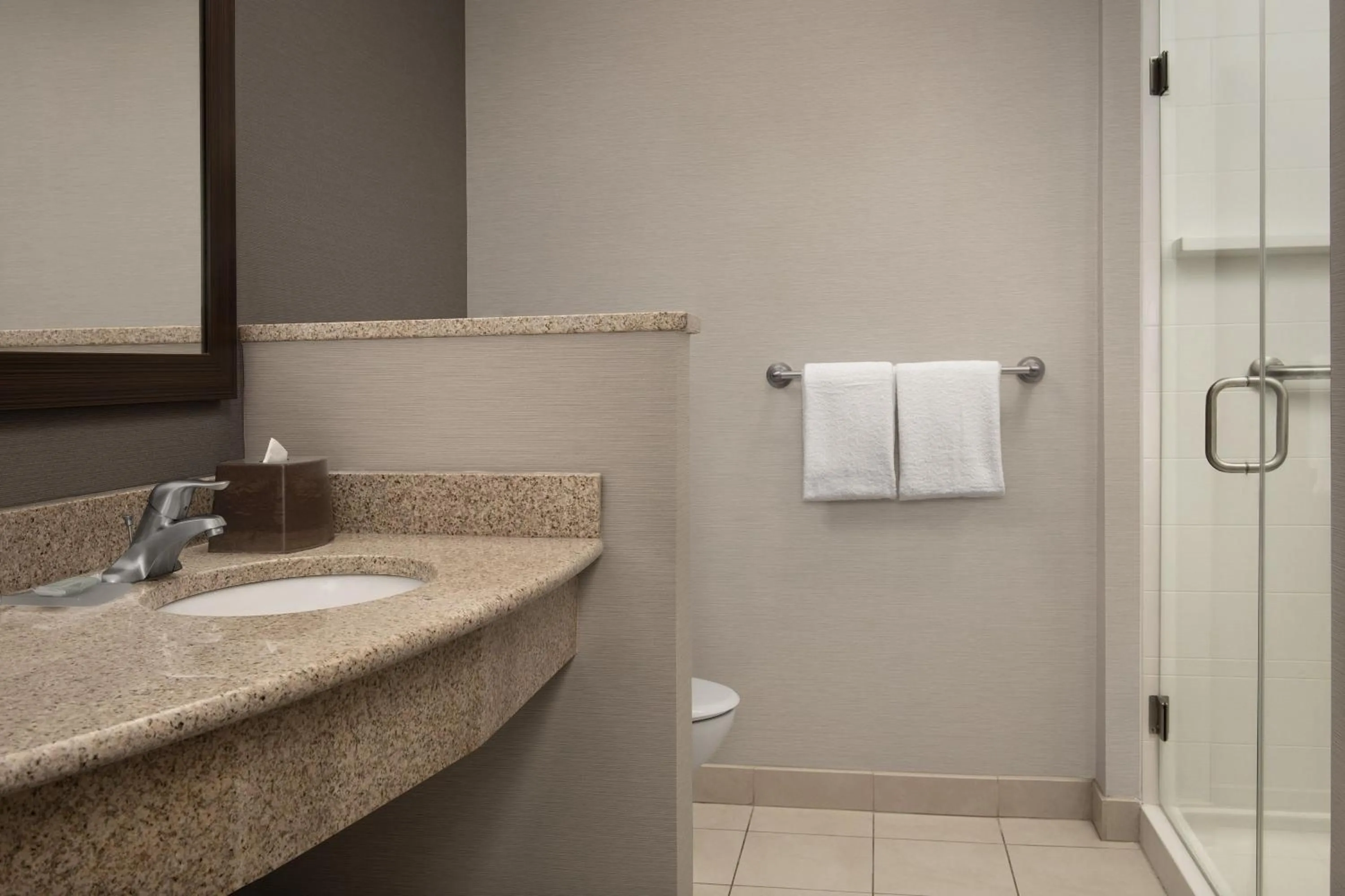 Bathroom in Courtyard by Marriott Syracuse Downtown at Armory Square