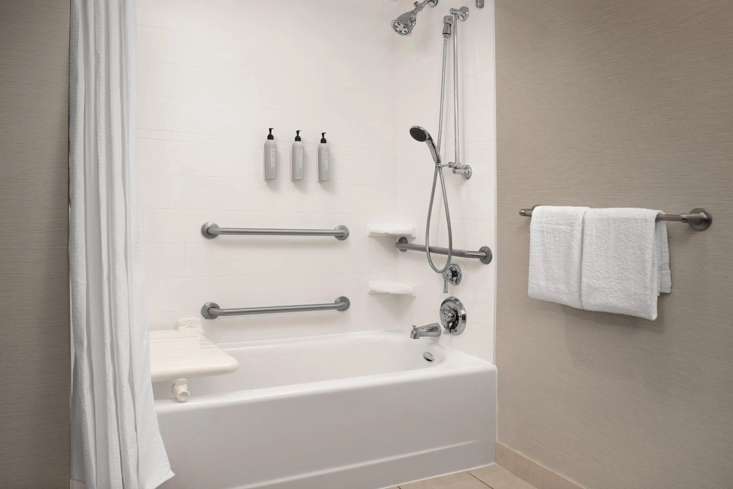 Bathroom in Courtyard by Marriott Syracuse Downtown at Armory Square