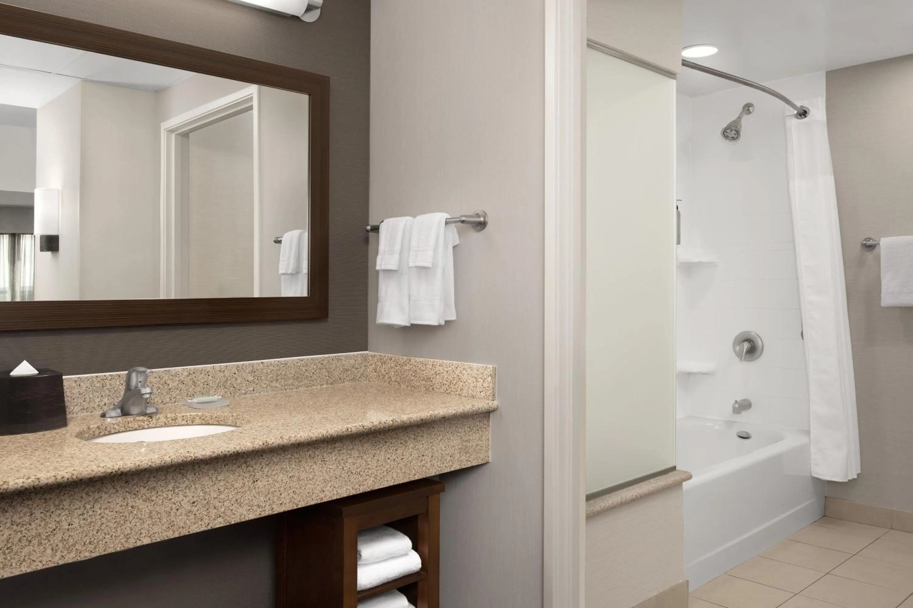 Bathroom in Courtyard by Marriott Syracuse Downtown at Armory Square