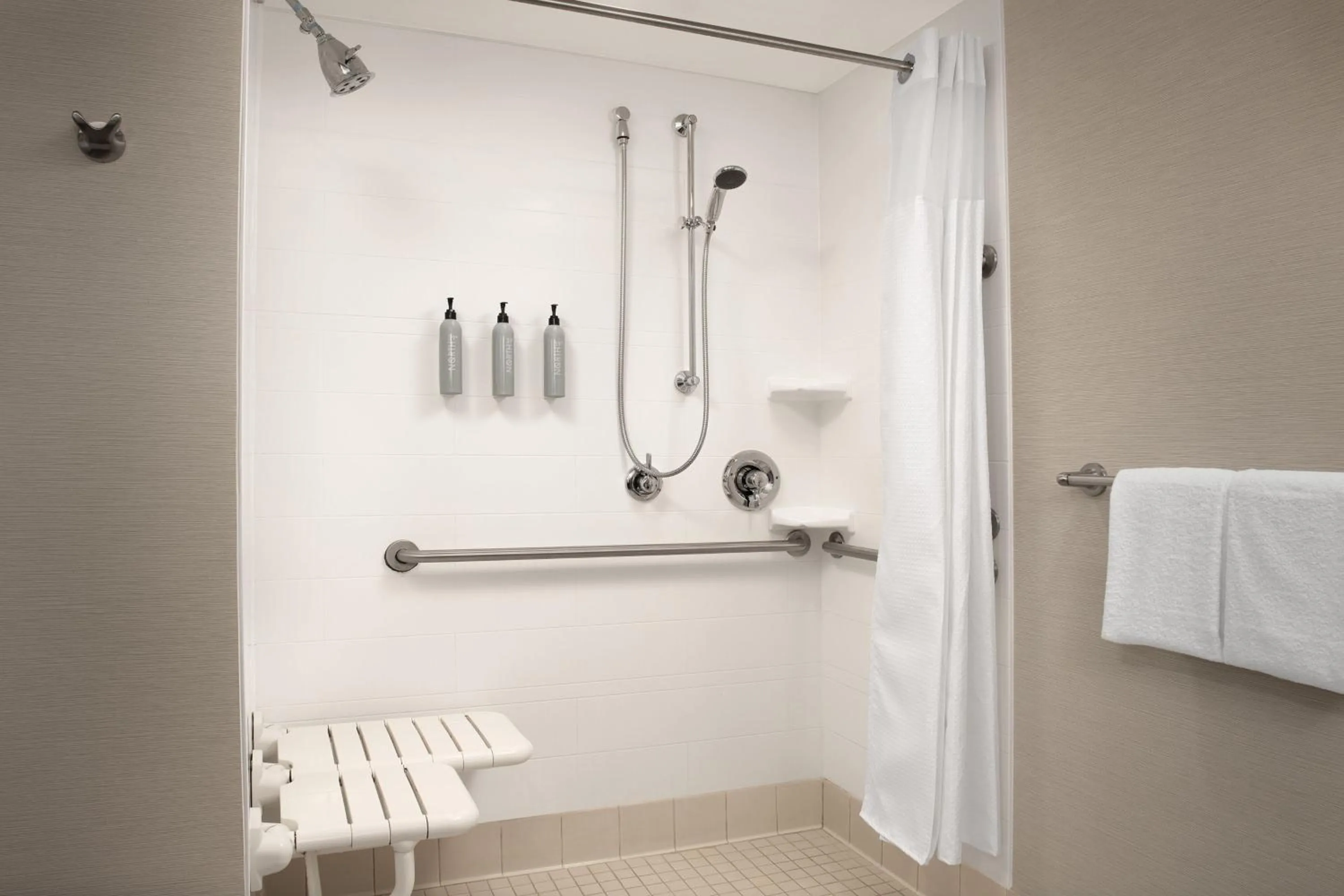 Bathroom in Courtyard by Marriott Syracuse Downtown at Armory Square