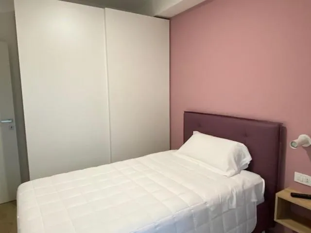 Bed in YOUMAMI Suite Hotel Wellness&Spa