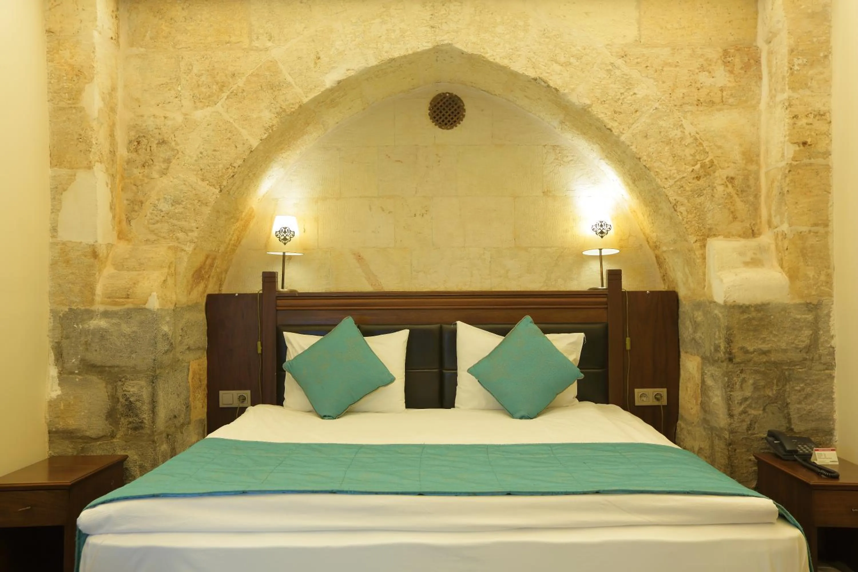 Bed in Sirehan Hotel