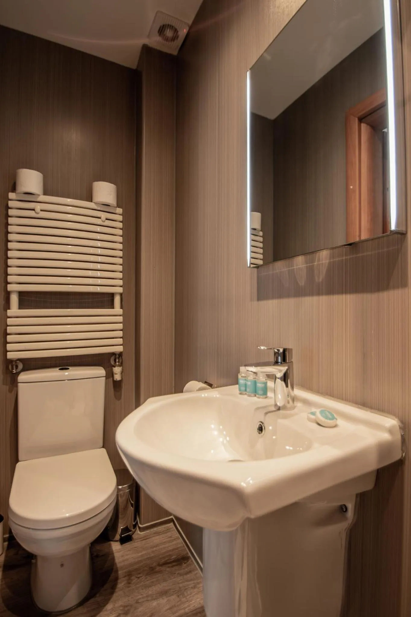 Toilet in New Kent Apartments