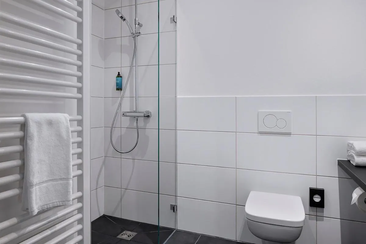 Shower in ECOME Hotel