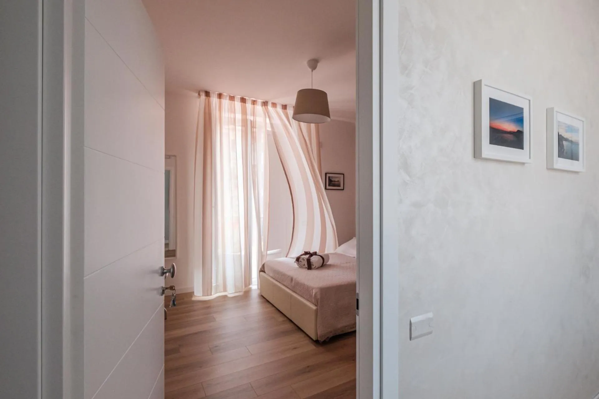 Communal lounge/ TV room, Bed in B&B Terza Luna