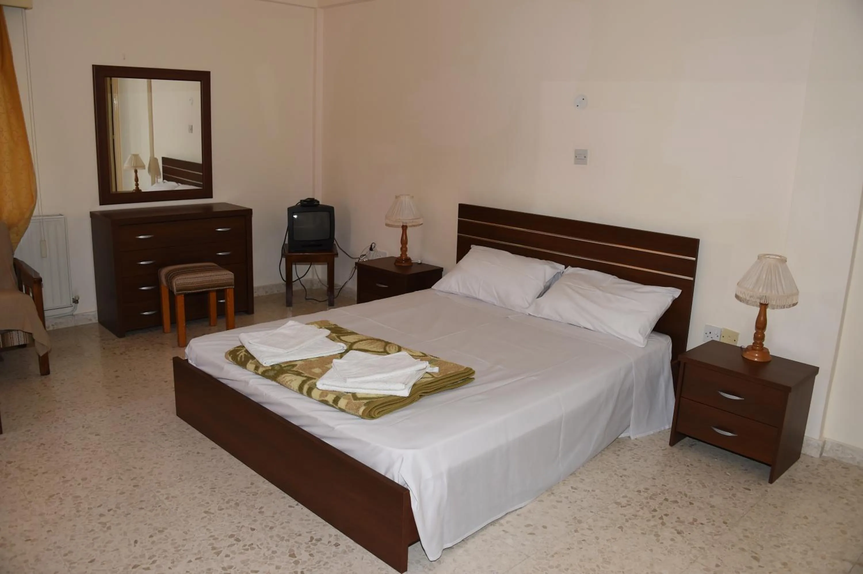 Bedroom in Odysseas & Eleni Hotel Apartments
