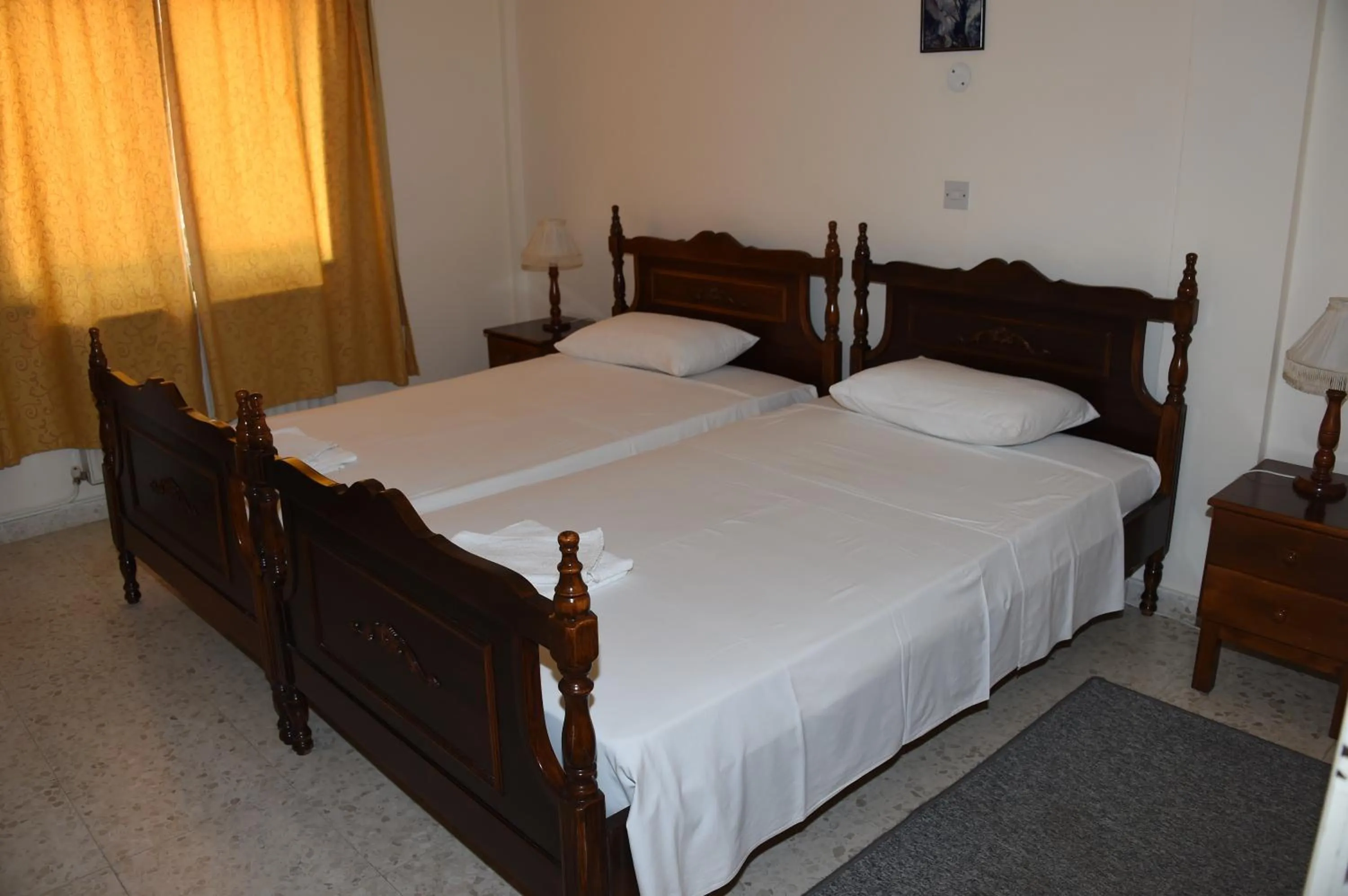 Bedroom in Odysseas & Eleni Hotel Apartments