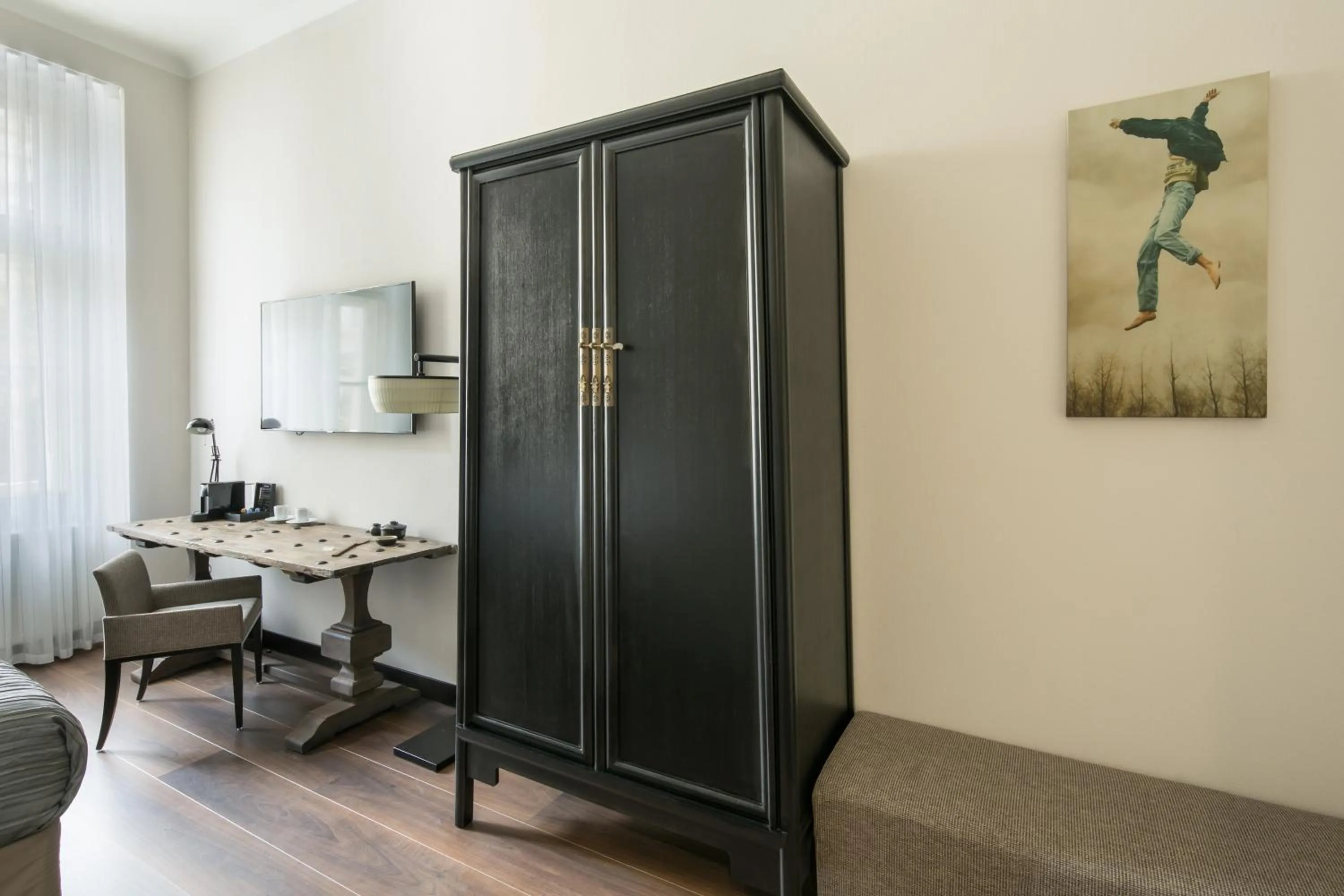 Communal lounge/ TV room in Quentin Prague Hotel