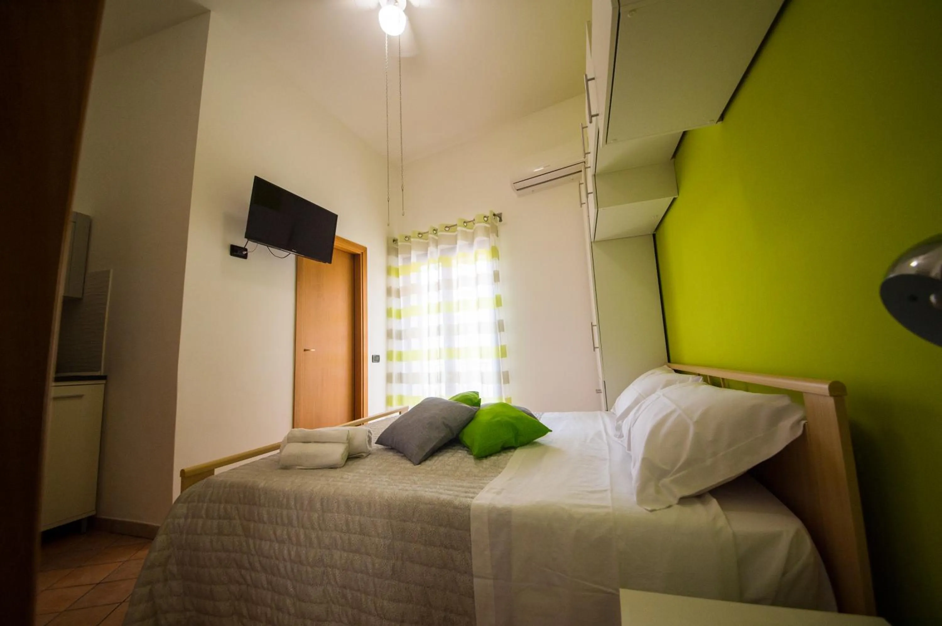 Bed in 'A Cumerdia - Casa Vacanze