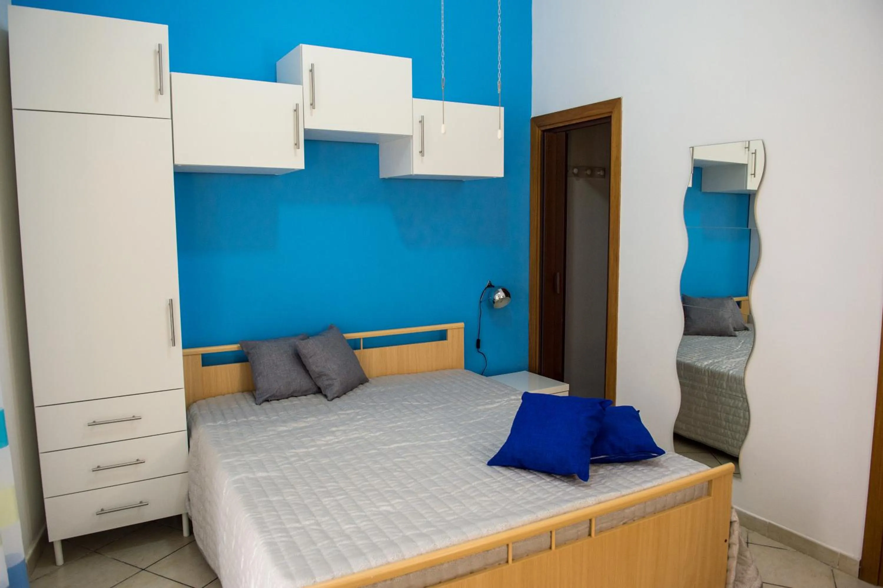 Bed in 'A Cumerdia - Casa Vacanze