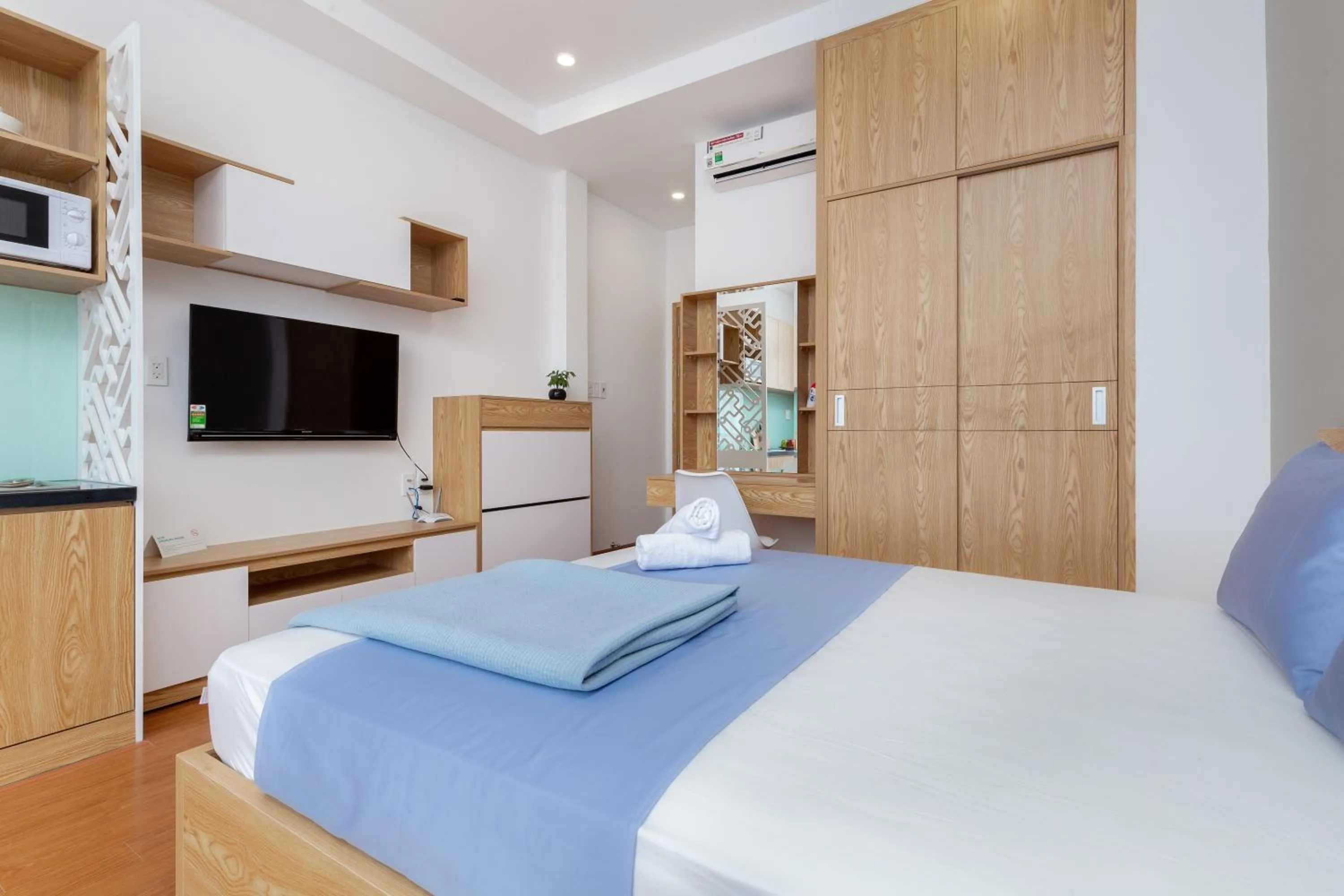 Communal lounge/ TV room, Bed in Cozrum Homes Lý Chính Thắng