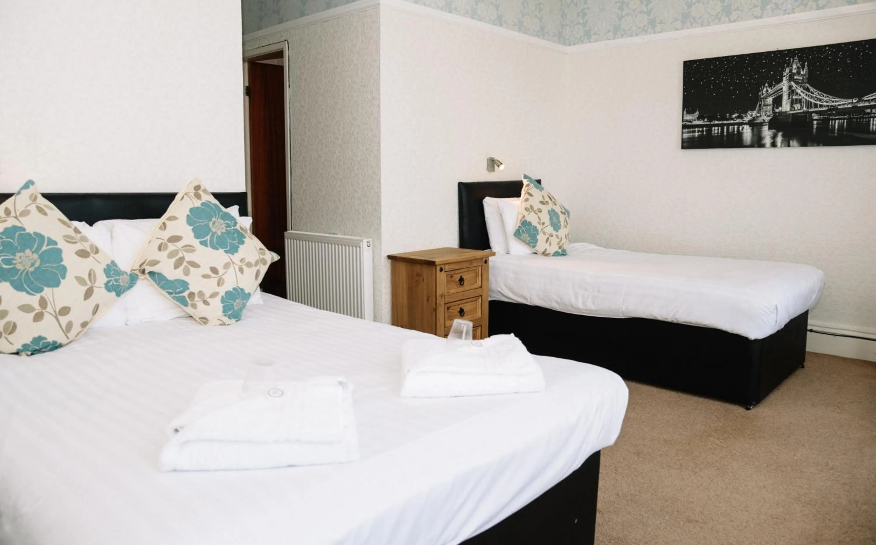 Bed in Four Oaks Hotel