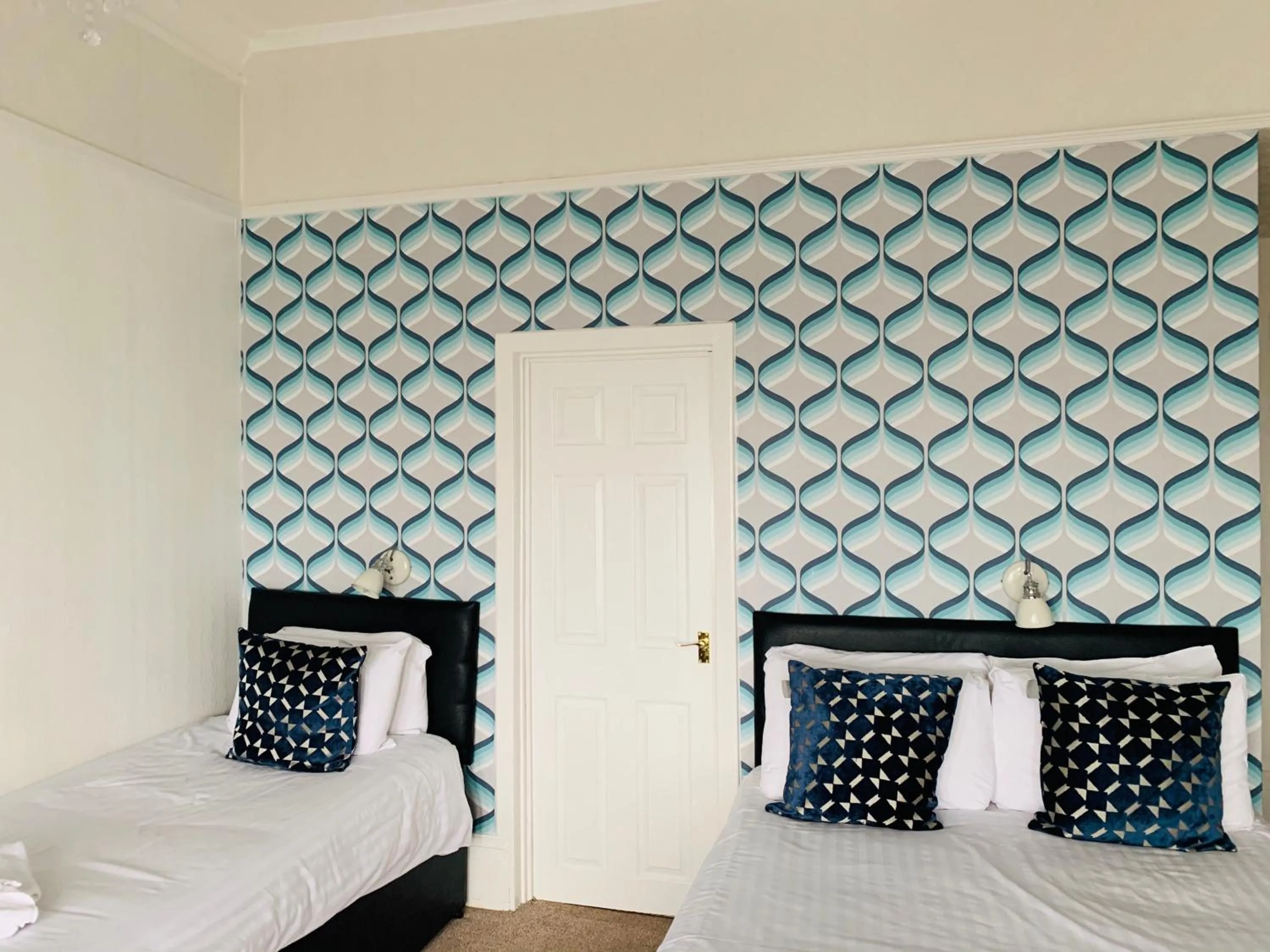 Bed in Four Oaks Hotel