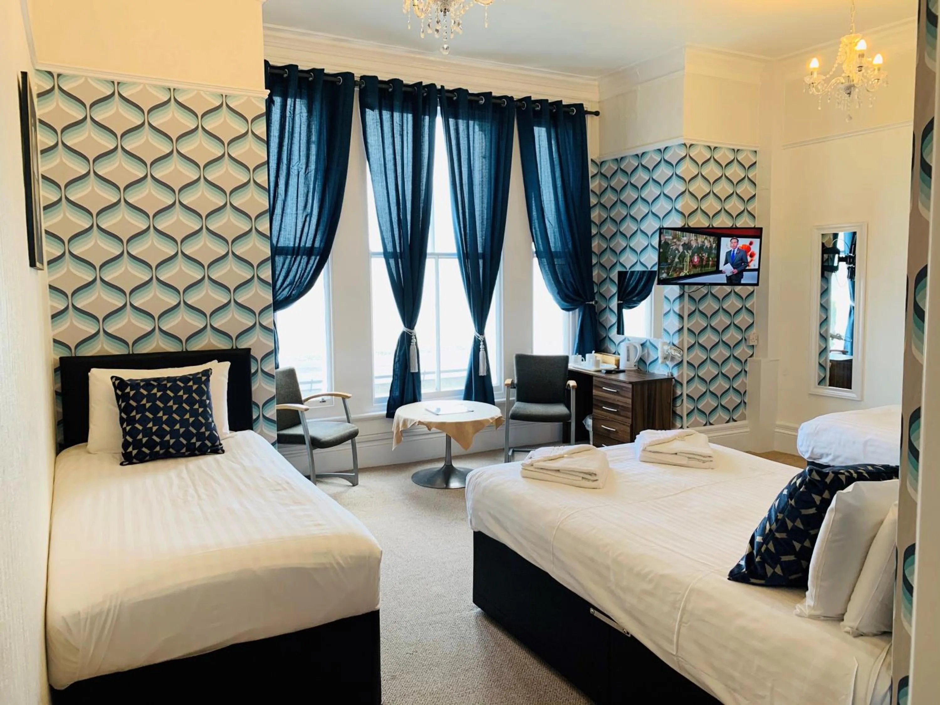 Bed in Four Oaks Hotel