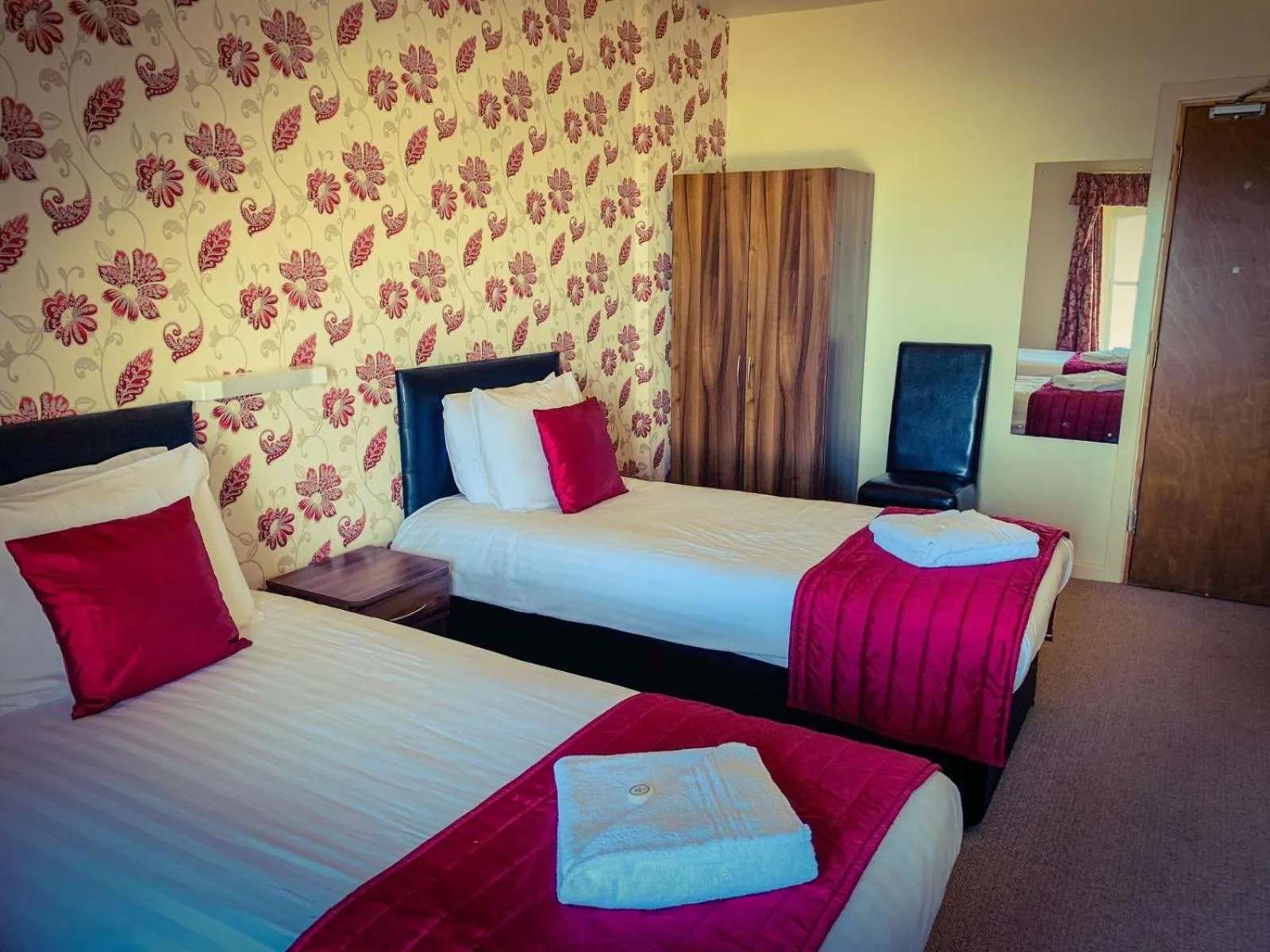 Bed in Four Oaks Hotel