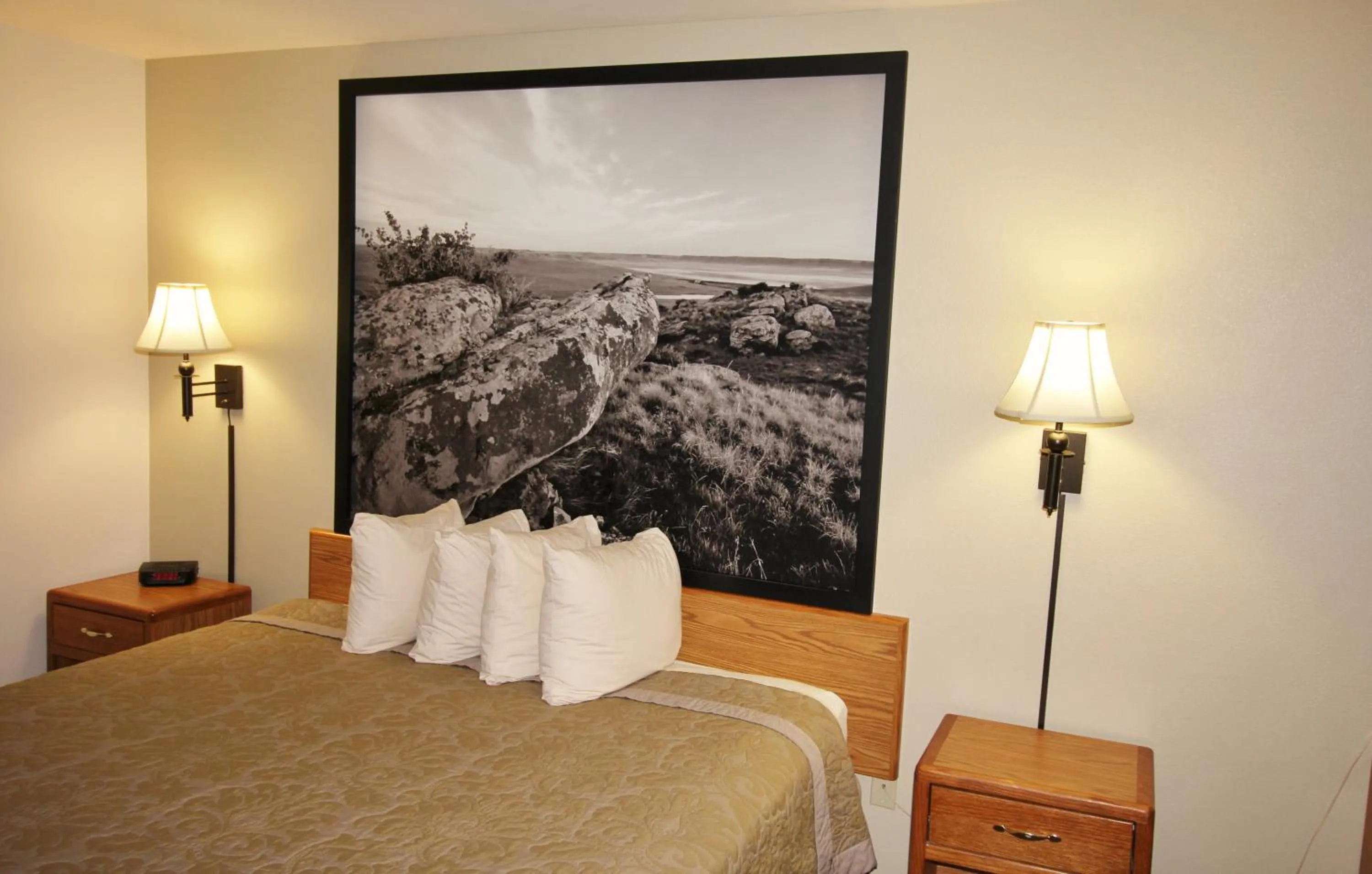 Bed in Homestead Inn and Suites