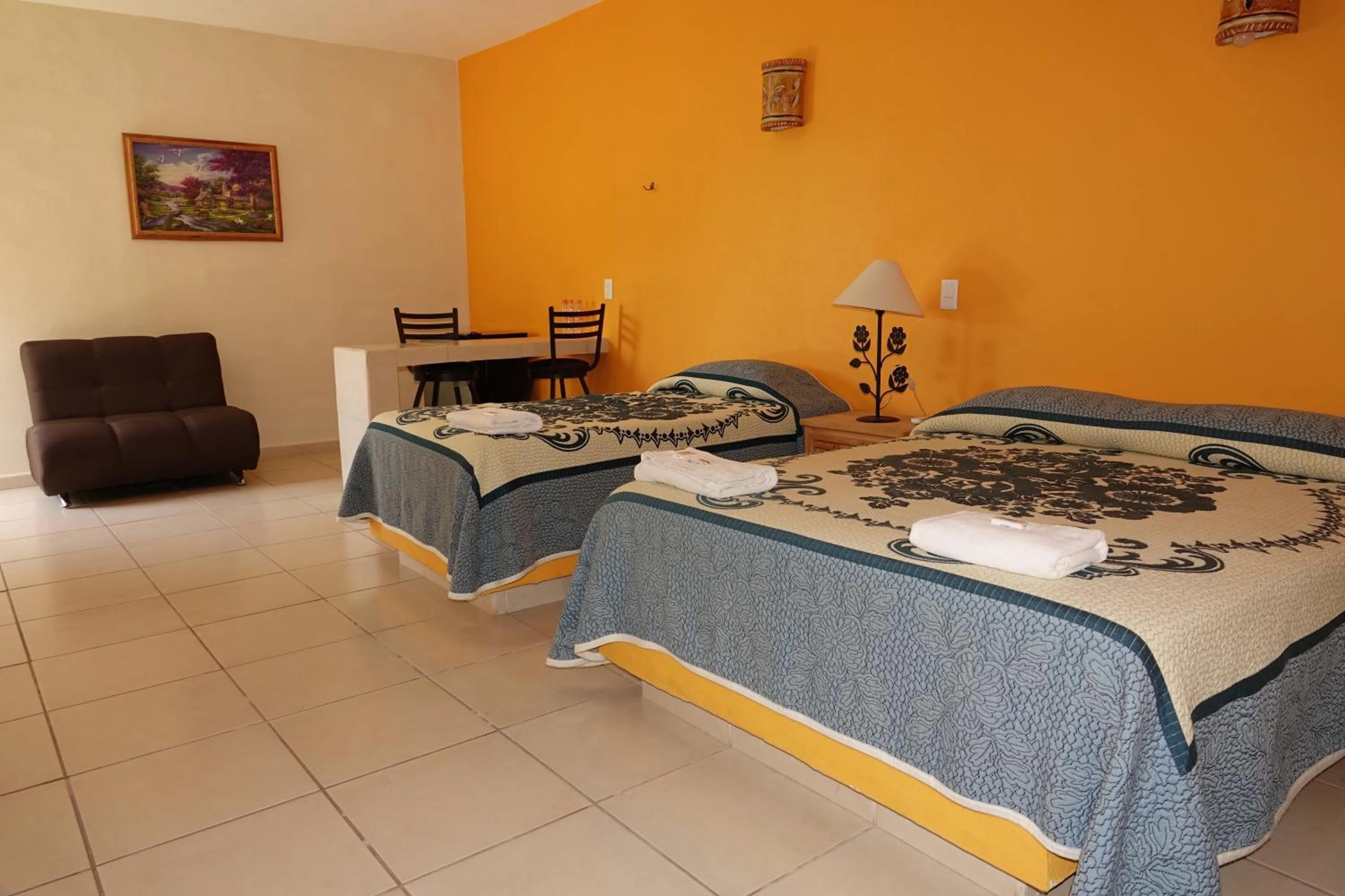 Photo of the whole room, Bed in Quinta Comala Hotel & Villas