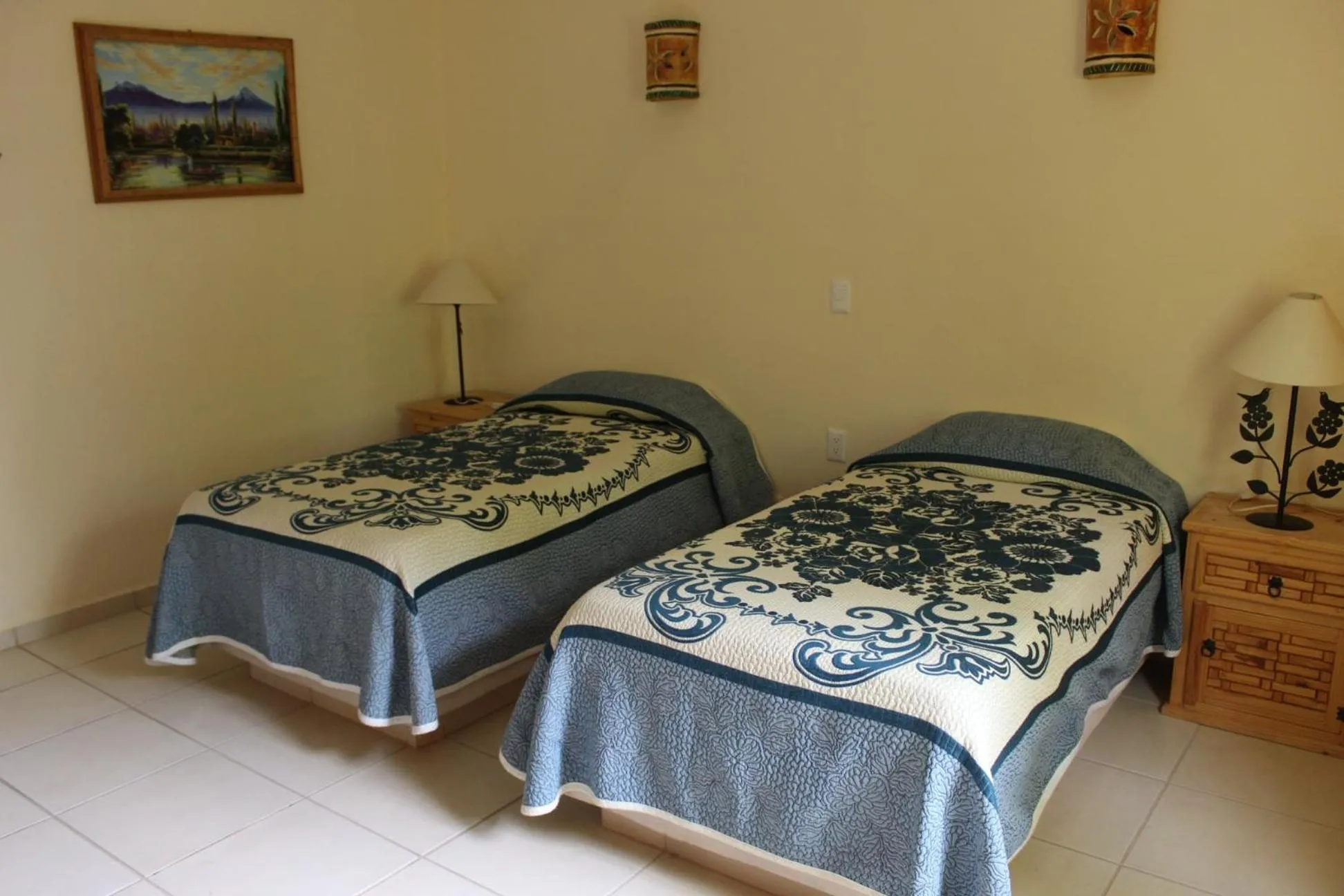 Bed in Quinta Comala Hotel & Villas